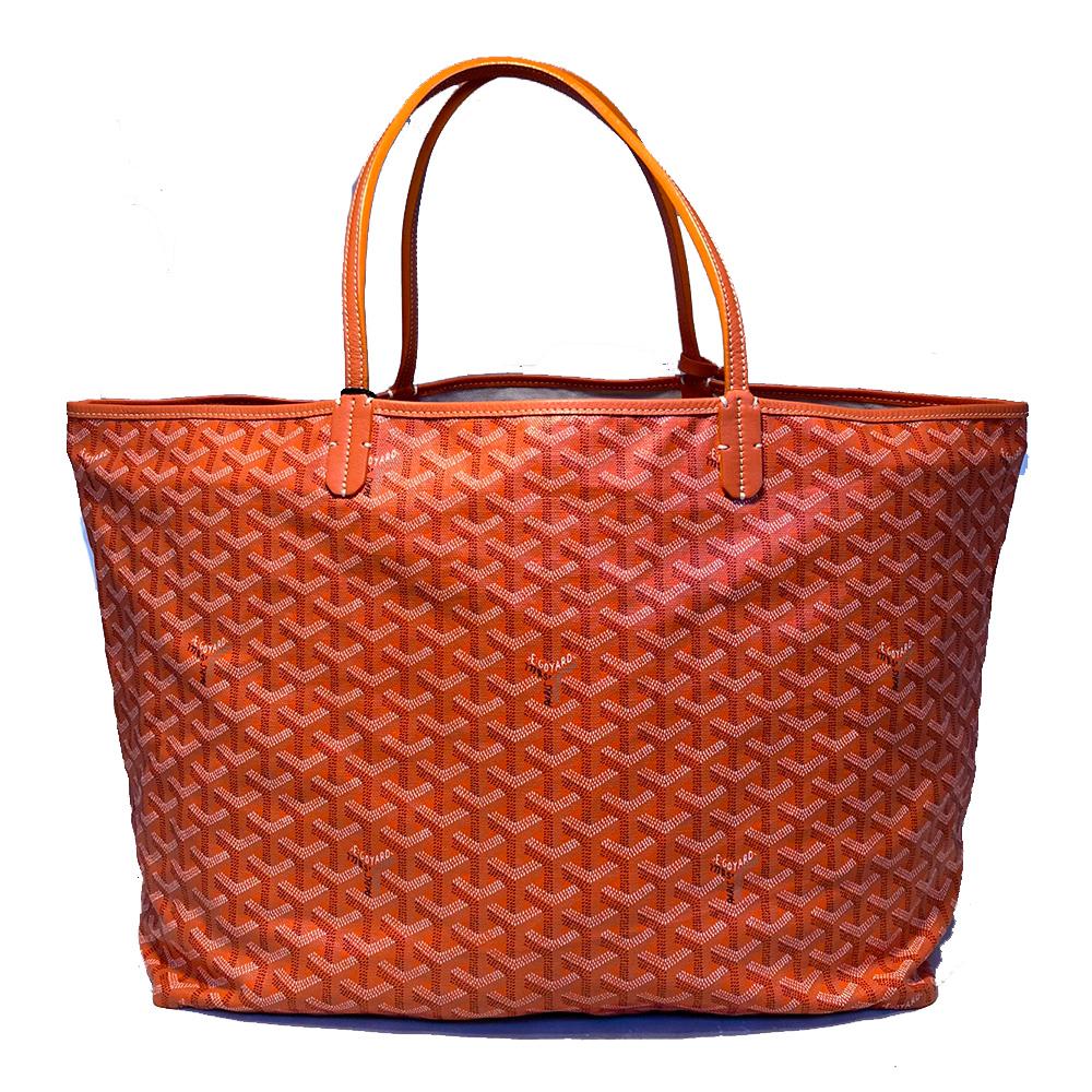 Goyard Monogram Orange St. Louis GM Tote in excellent condition. Orange monogram canvas exterior trimmed with orange leather. Beige canvas interior with removable matching wallet pouch. No exterior stains smells or scuffs. 3 very small marks on