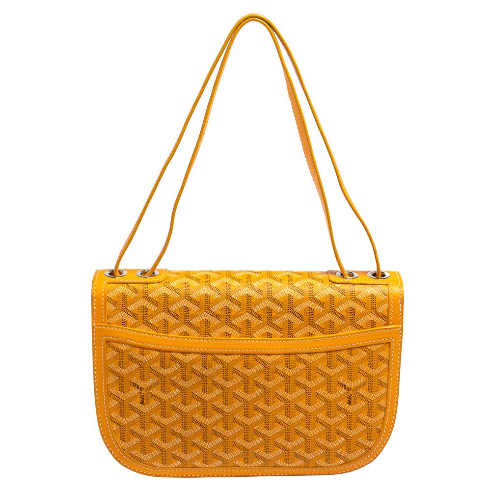 We are showering our love on this 223 PM bag from Goyard as it is stylish and gorgeous. The bag is marked by qualities such as refined craftsmanship and first-rate classic style. It is crafted from their Goyardine coated canvas and features leather