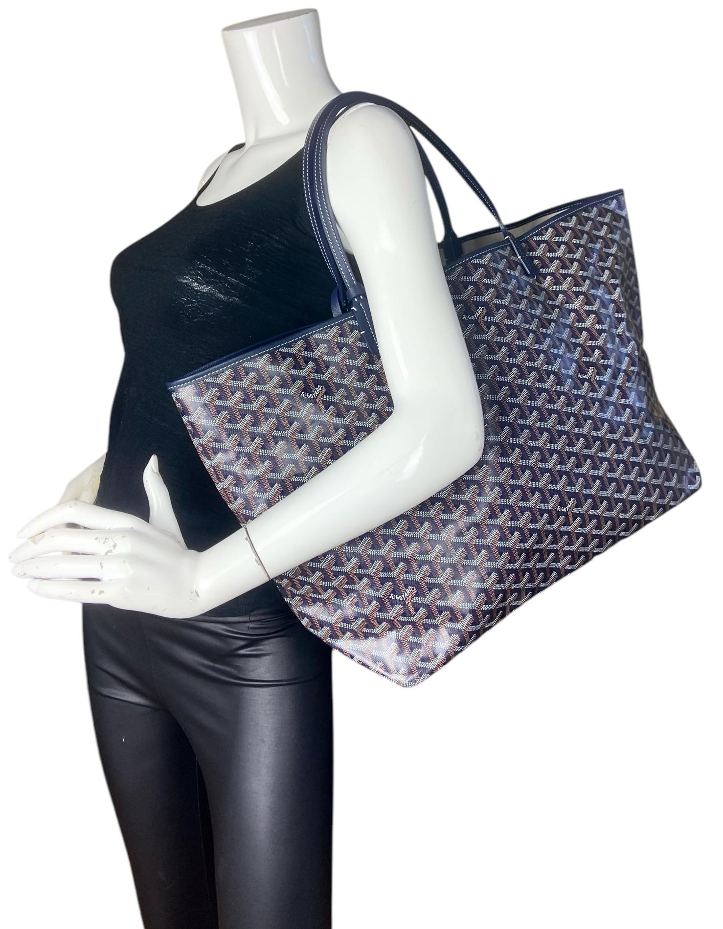 Goyard Navy Blue Goyardine Canvas St. Louis GM Tote Bag

Made In: France
Color: Navy blue
Hardware: Silvertone
Materials: Canvas
Lining: Canvas
Closure/Opening: Open top
Exterior Pockets: None
Interior Pockets: Insert with snap closure
Exterior