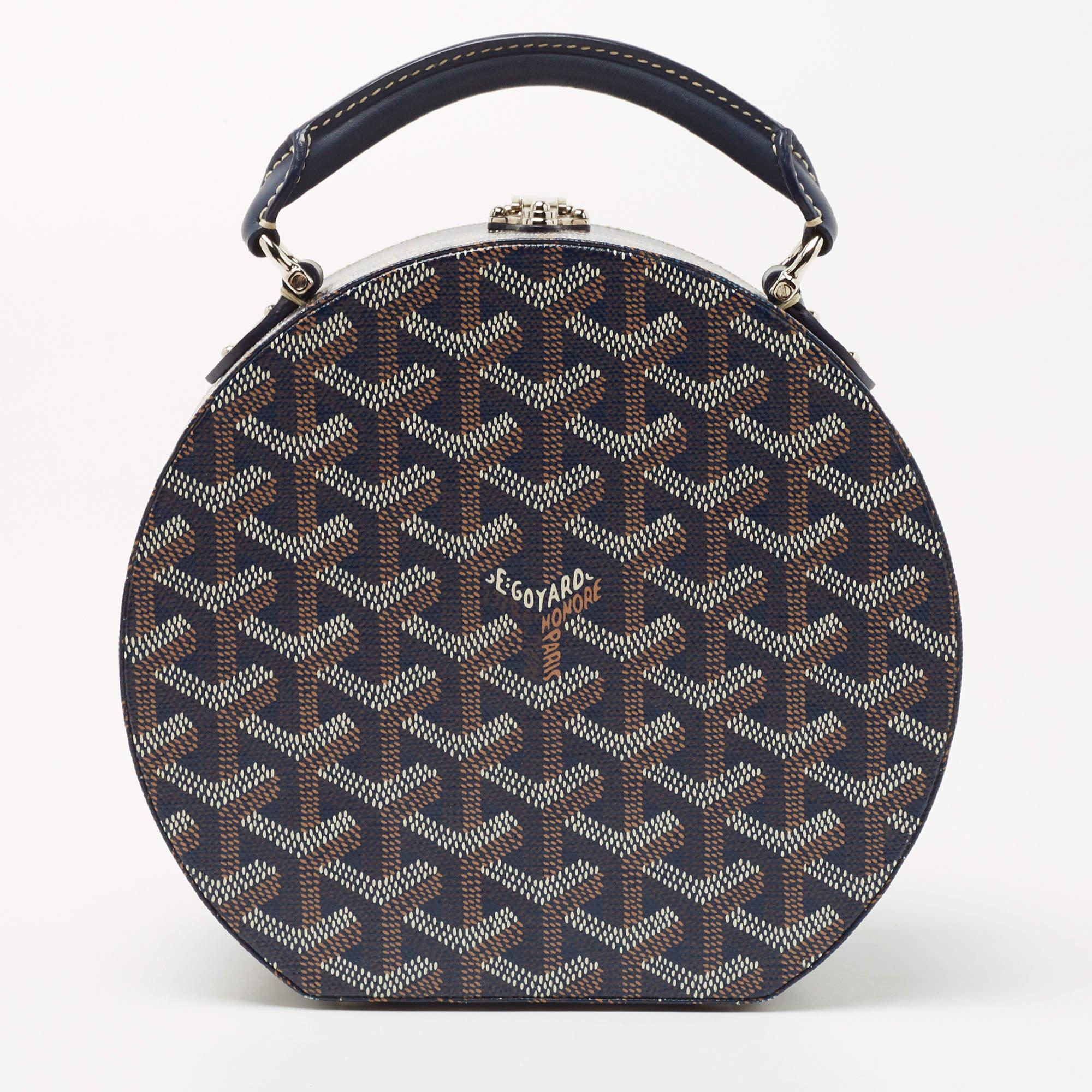 Goyard dives into its rich history of trunk-making to find the inspiration for the Alto hatbox bag. The brand's classic hatbox is transformed into a miniature version—one that is both practical and truly timeless. This Alto hatbox is constructed