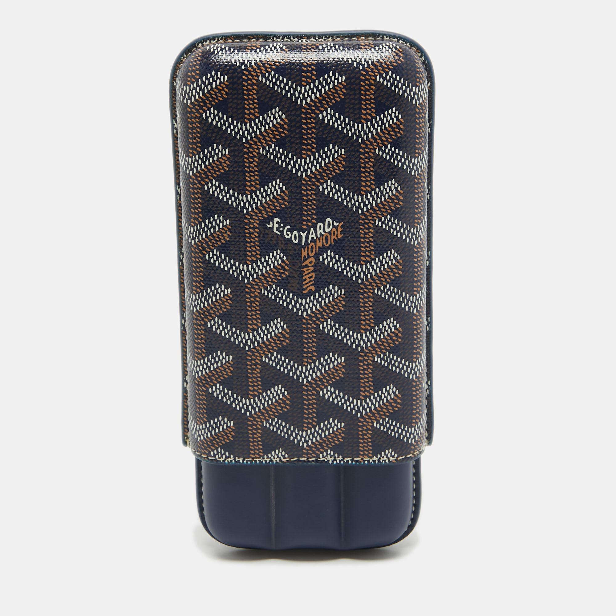 This Churchill cigar case from the house of Goyard is crafted from signature Goyardine-coated canvas as well as leather and designed to hold up to three cigars.

