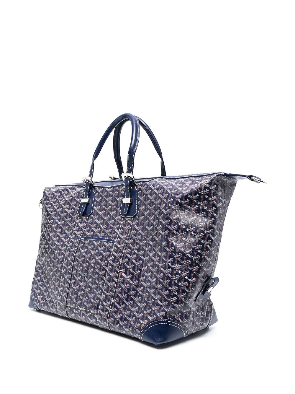 Elegant Goyard Boeing 55 travel bag in navy monogram canvas and navy leather, hardware in silver metal, double adjustable handle in navy leather allowing the bag to be worn in the hand. The zip closure opens up to the main compartment and a smaller