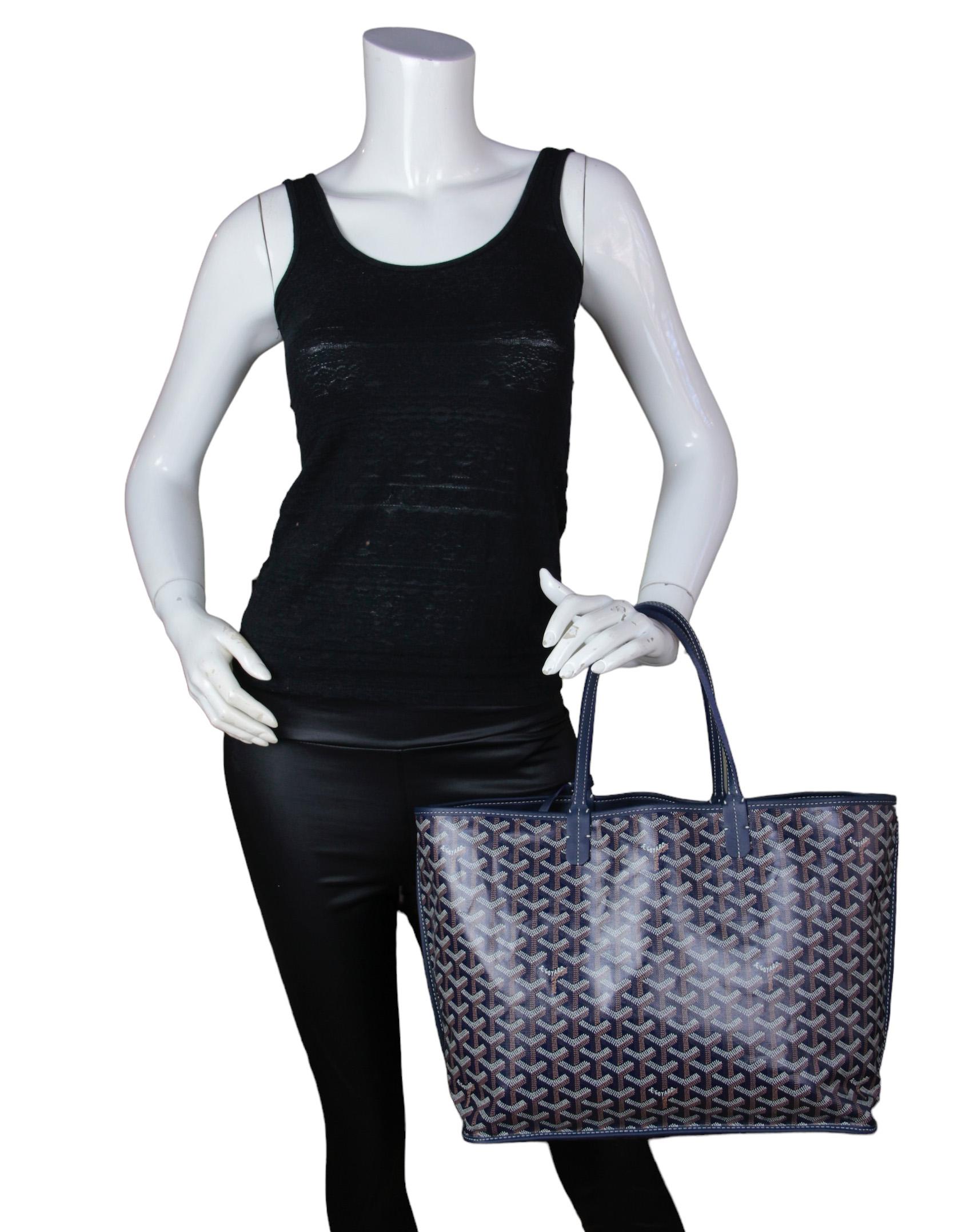 Goyard Navy Canvas/ Leather Reversible Anjou PM Tote Bag

Made In: France
Color: Navy
Materials: Canvas and leather
Closure/Opening: Open top
Exterior Pockets: None
Interior Pockets: Detachable insert with snap closure
Exterior Condition: 