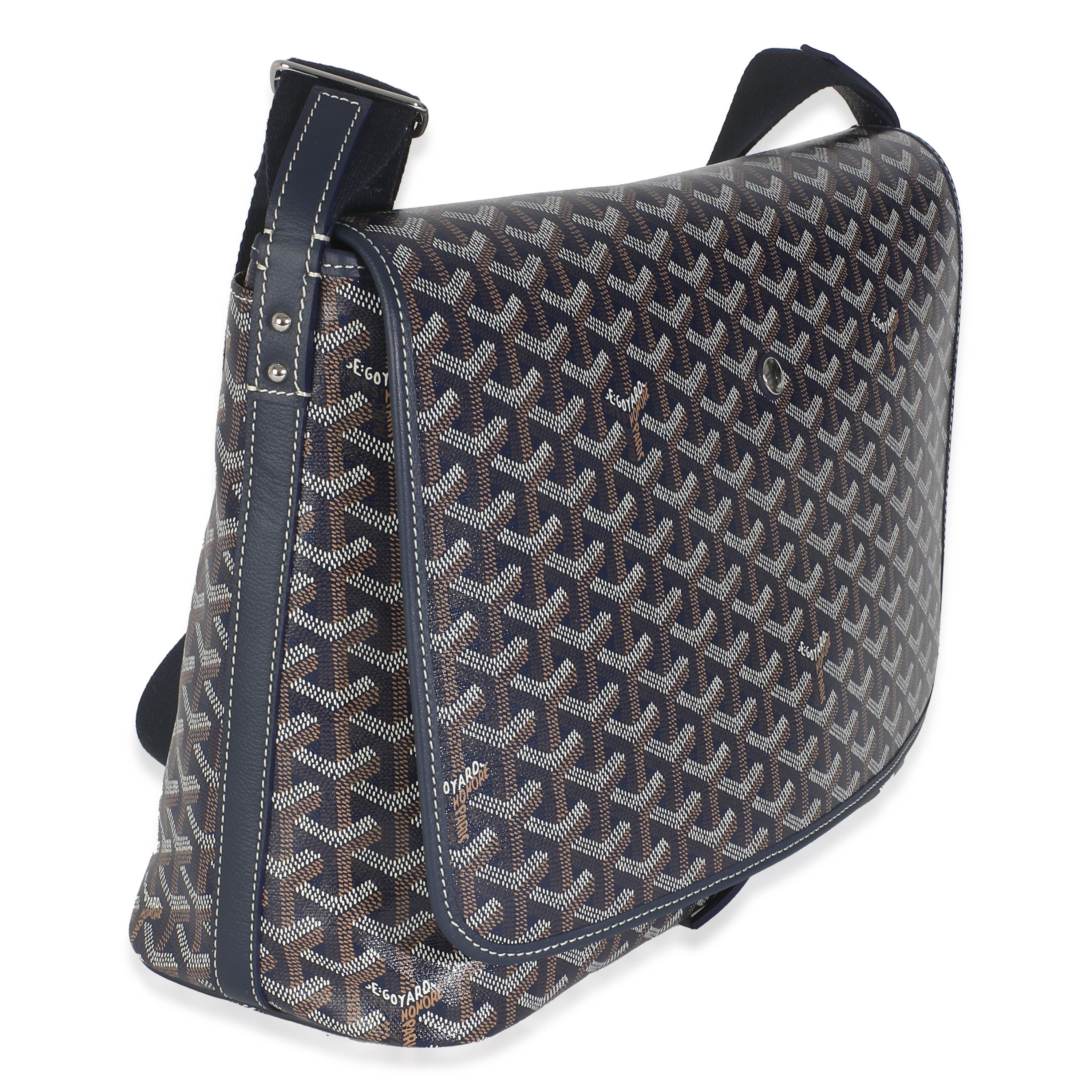 Listing Title: Goyard Navy Goyardine Canvas Capetien Messenger
SKU: 146160
Condition: Pre-owned 
Condition Description: Goyard’s signature Goyardine pattern has quietly taken over the luxury fashion scene. A heritage brand that has been around since