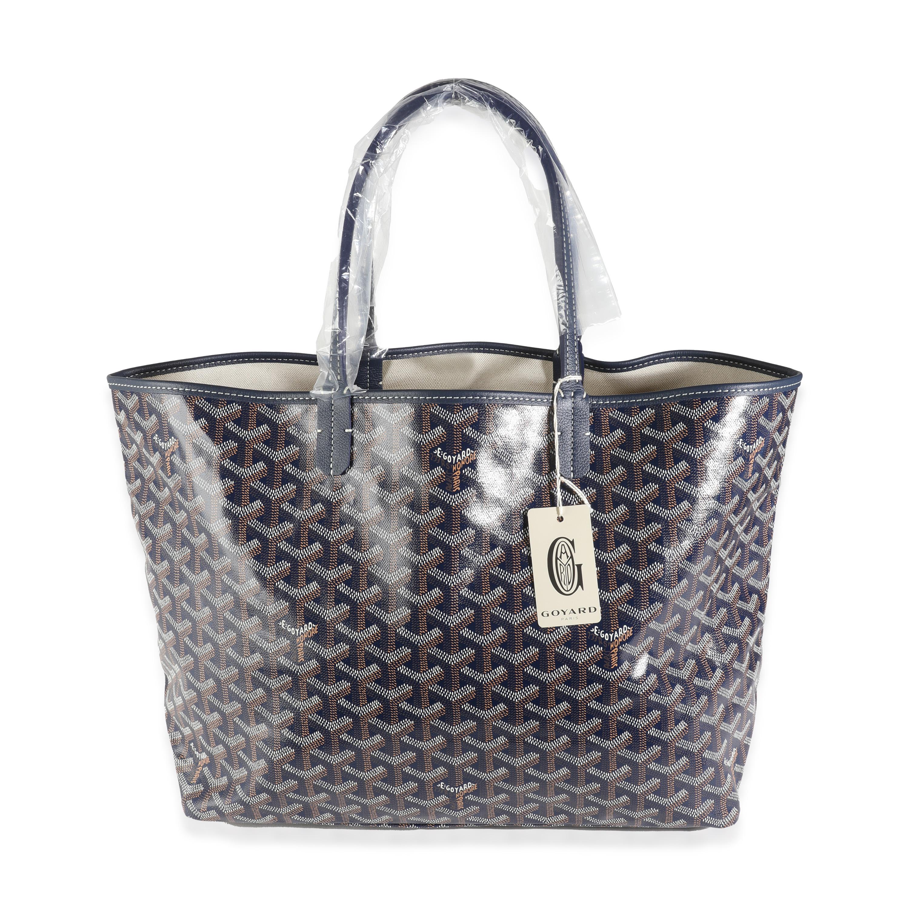 Listing Title: Goyard Navy Goyardine Canvas Saint Louis PM
SKU: 144339
Condition: Pre-owned 
Condition Description: Goyard’s signature Goyardine pattern has quietly taken over the luxury fashion scene. A heritage brand that has been around since