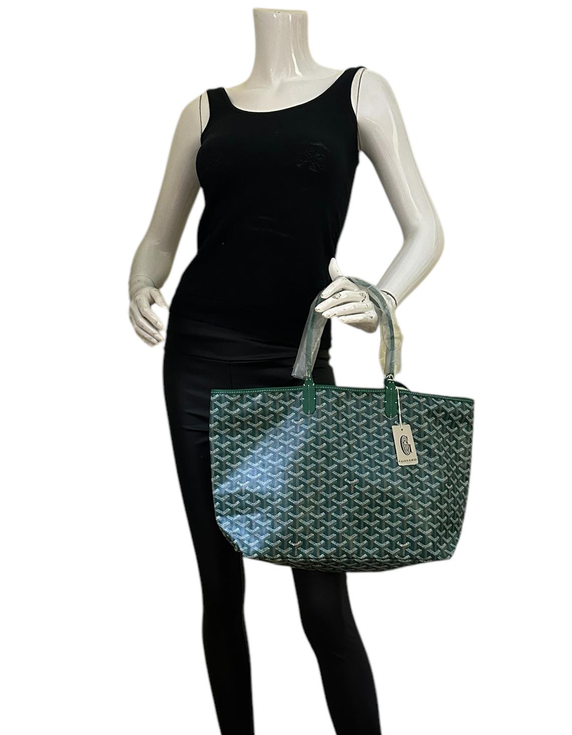 Goyard Green Canvas Goyardine Saint Louis PM Tote Bag w/ Insert

Made In: France
Color: Green
Hardware: Silvertone
Materials: Canvas
Lining: Canvas
Closure/Opening: Open top
Exterior Pockets: None
Interior Pockets: Insert with snap closure
Exterior