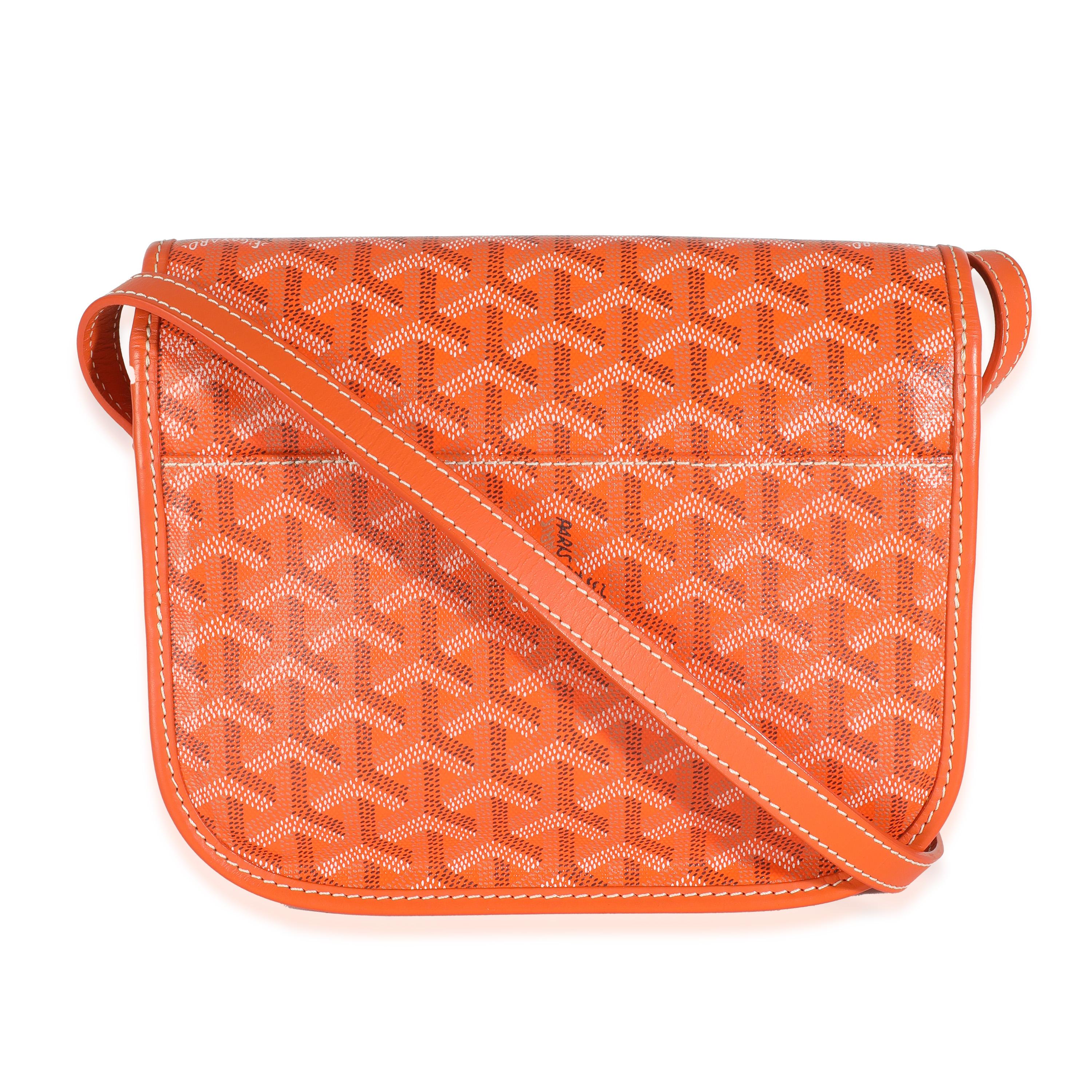 Listing Title: Goyard Orange Goyardine Canvas Belvedere II PM
SKU: 143802
Condition: Pre-owned 
Condition Description: Goyard’s signature Goyardine pattern has quietly taken over the luxury fashion scene. A heritage brand that has been around since