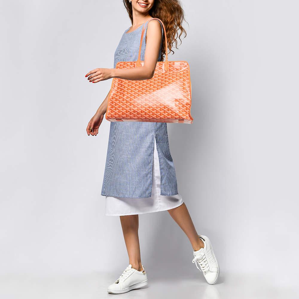 This Hardy PM tote from Goyard is stylish  sturdy  and practical for everyday use. It is crafted using Goyardine canvas and leather on the exterior. This tote is provided with two handles  silver toned hardware  and a fabric lined interior.