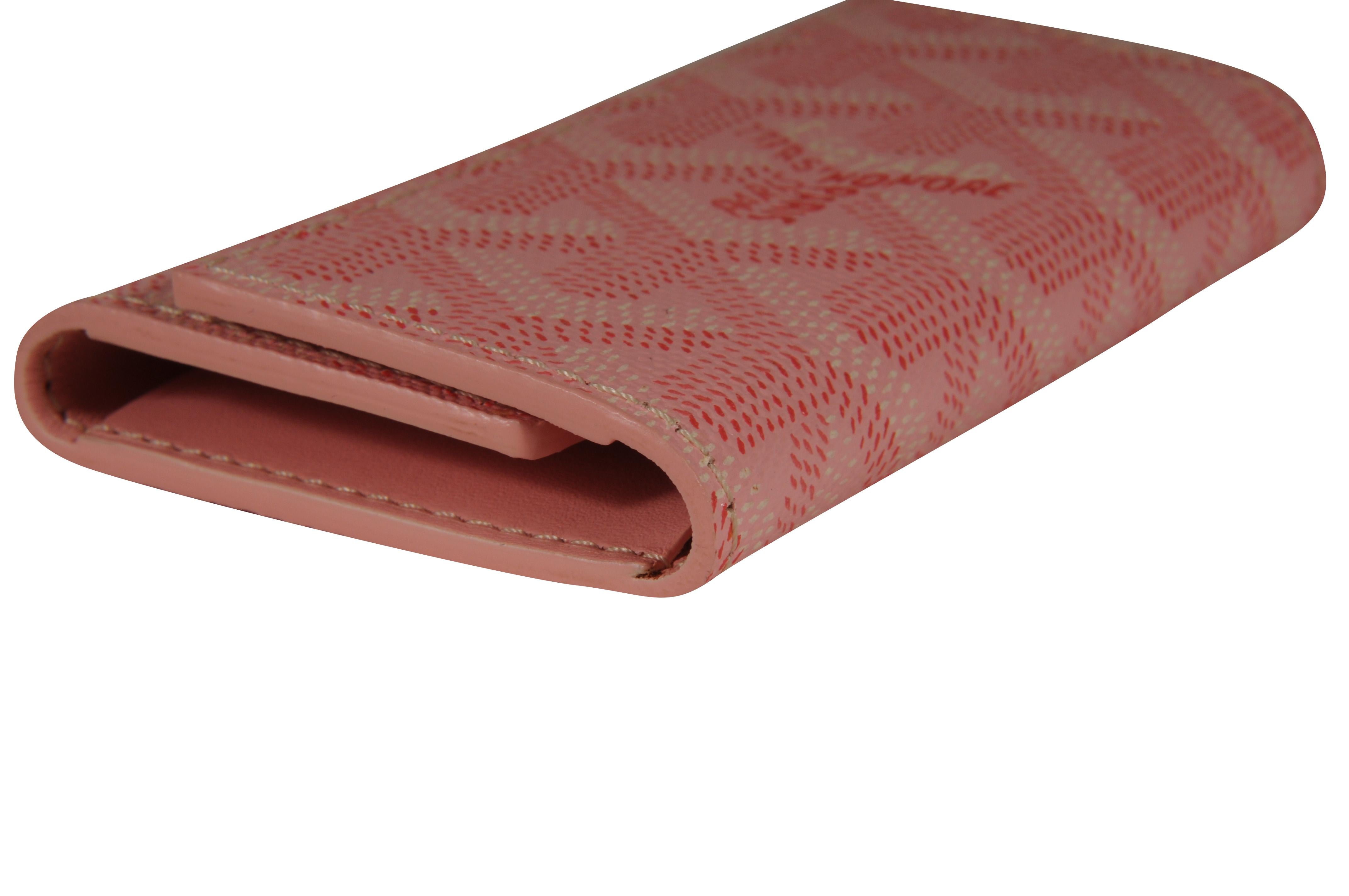 Cartera de viaje con seis llaveros Goyard Saint Michel rosa en venta 7