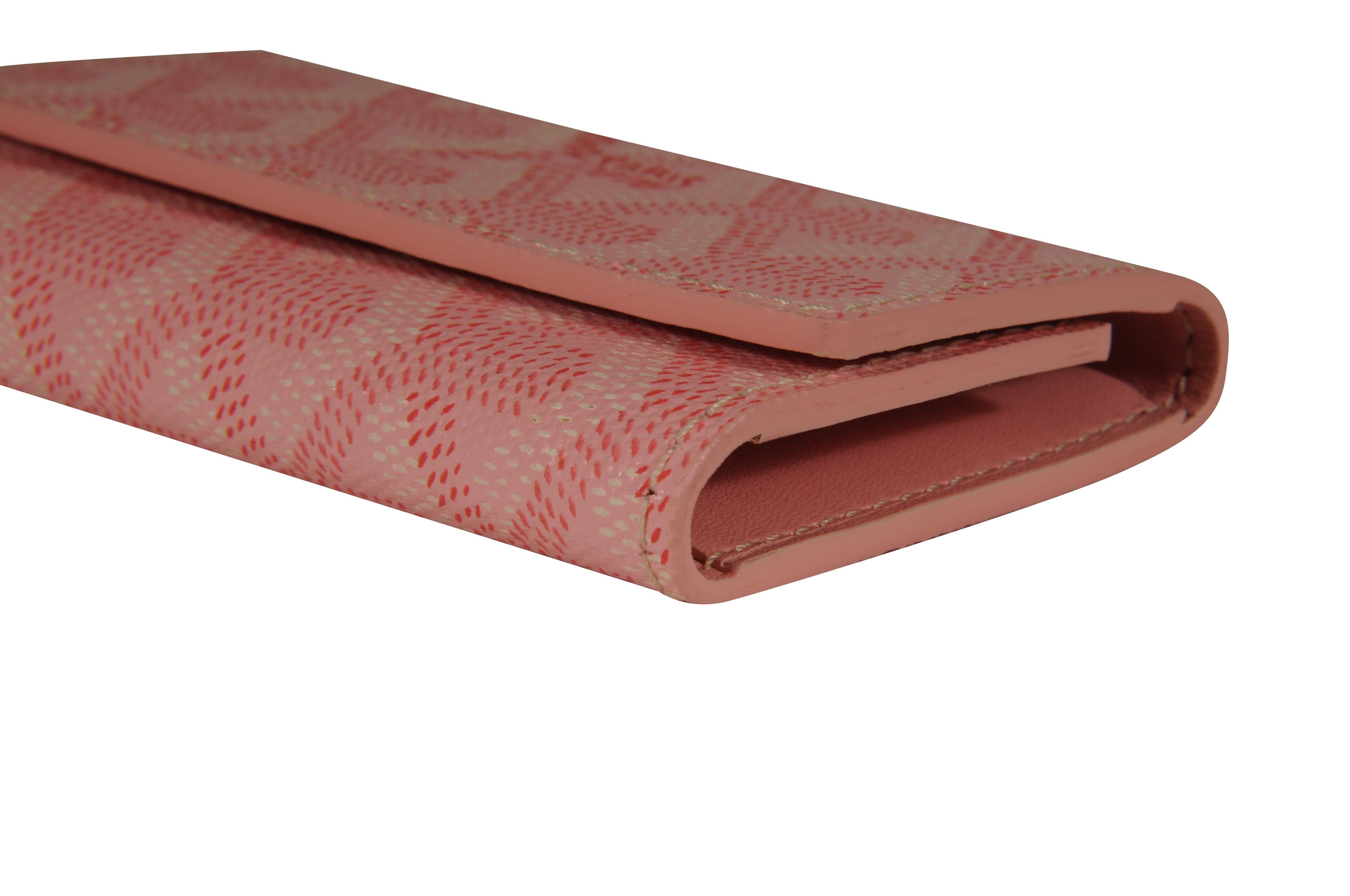 Cartera de viaje con seis llaveros Goyard Saint Michel rosa en venta 8