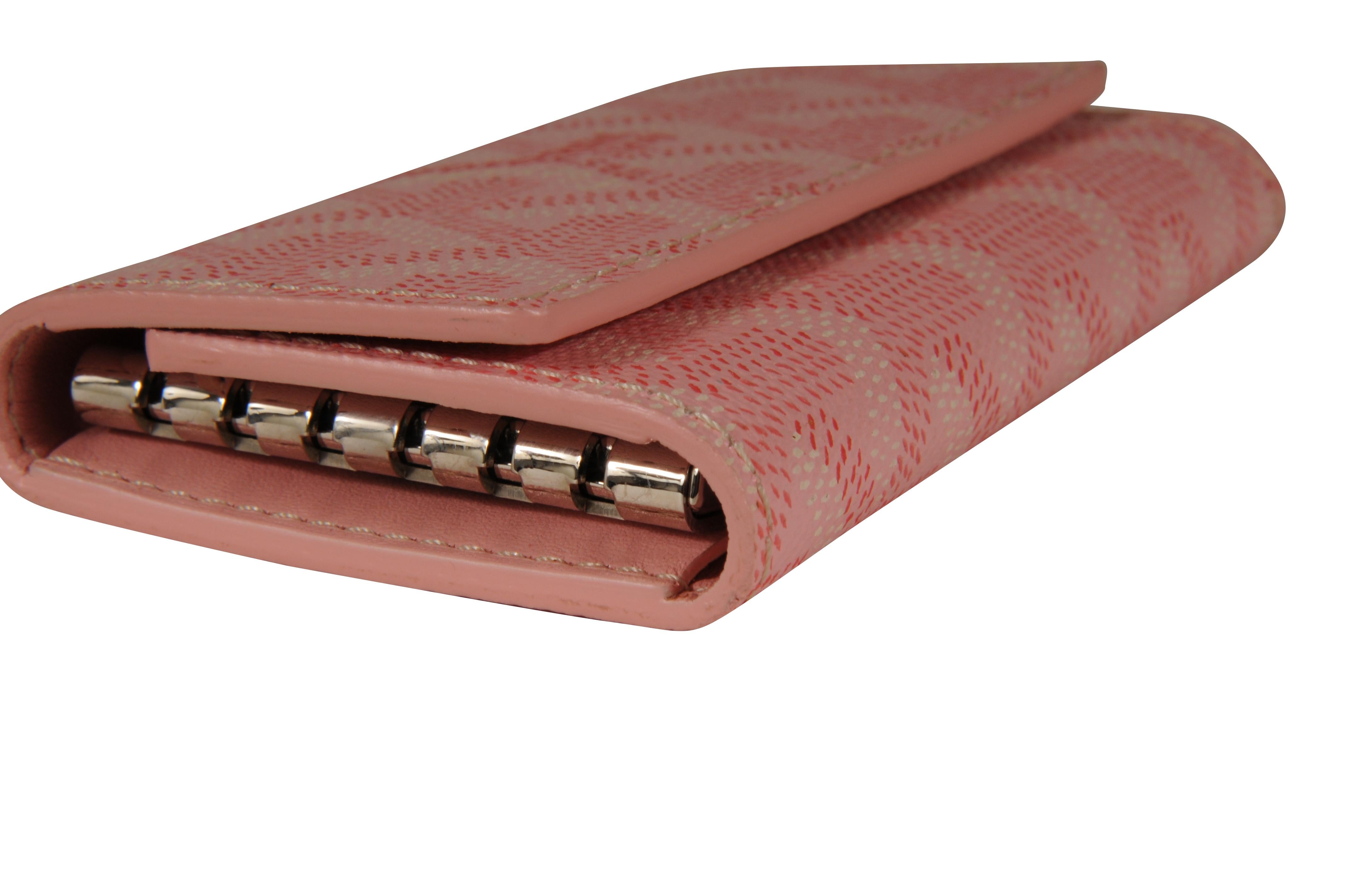 Cartera de viaje con seis llaveros Goyard Saint Michel rosa en venta 9