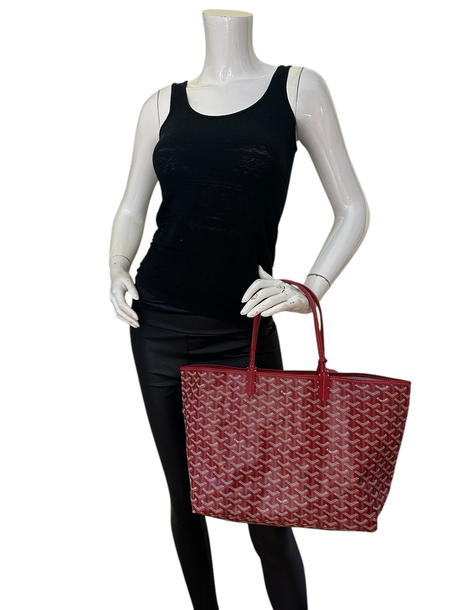 Goyard Red Canvas Goyardine Saint Louis PM Tote Bag w/ Insert

Made In: France
Color: Red
Hardware: Silvertone
Materials: Canvas
Lining: Canvas
Closure/Opening: Open top
Exterior Pockets: None
Interior Pockets: Insert with snap closure
Exterior