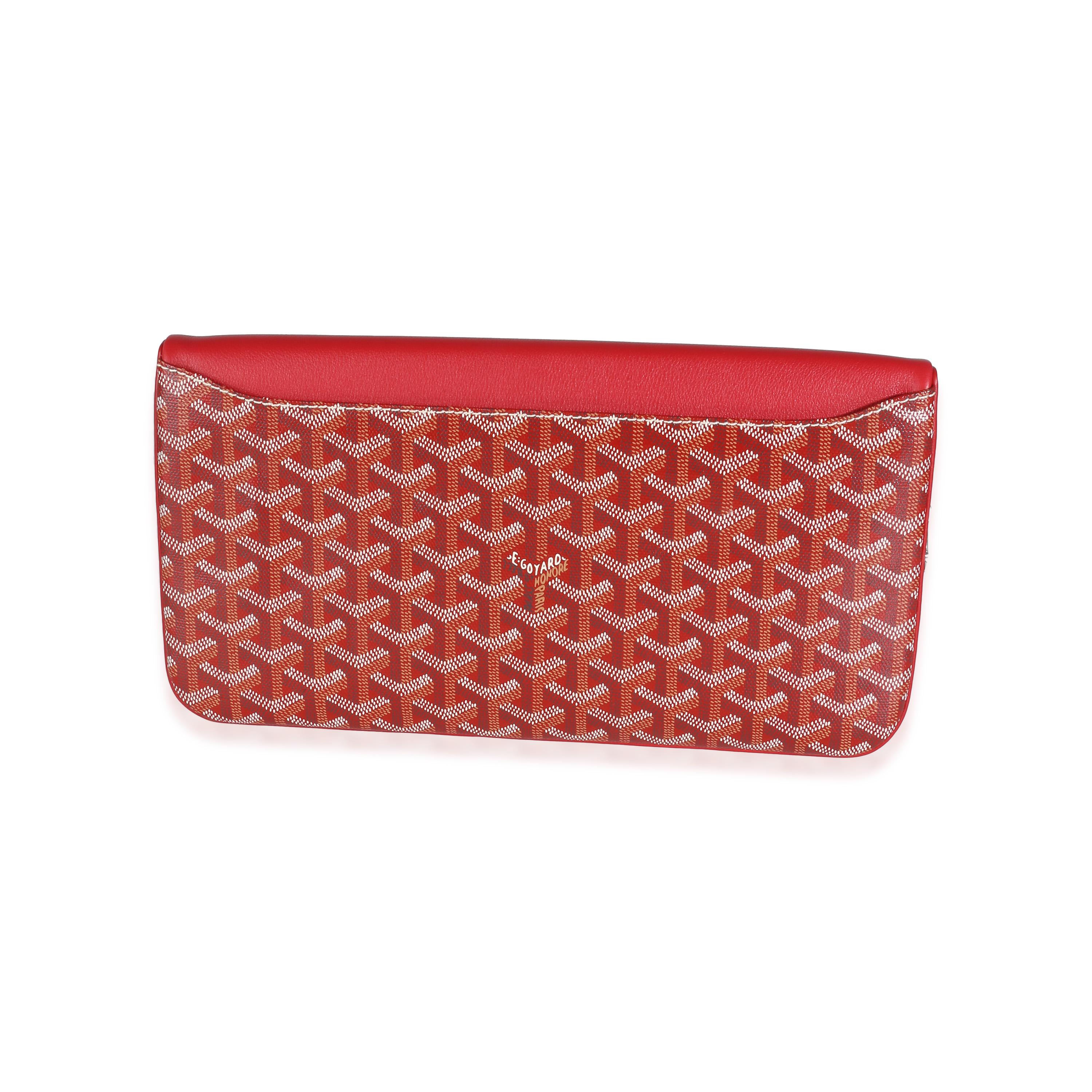 Listing Title: Goyard Red Goyardine Canvas Sainte Marie Clutch
SKU: 142857
Condition: Pre-owned 
Condition Description: Goyard’s signature Goyardine pattern has quietly taken over the luxury fashion scene. A heritage brand that has been around since