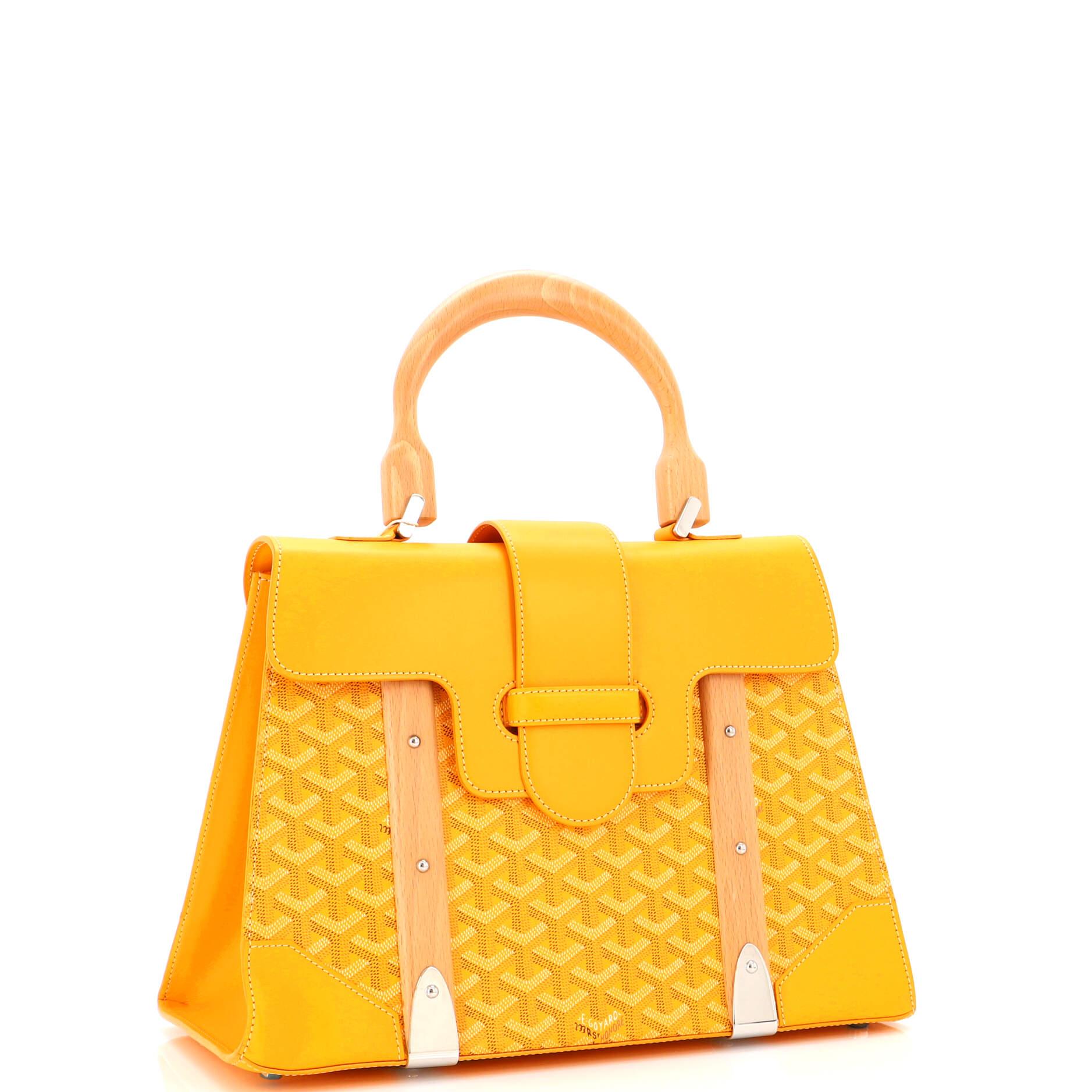 Condition: Very good. Slight odor in interior. Loss of shape on front base corner, creasing, minor wear, scuffs and indentations on leather trims, small marks underneath flap and in interior. Wear in interior, scratches on hardware.
Accessories: