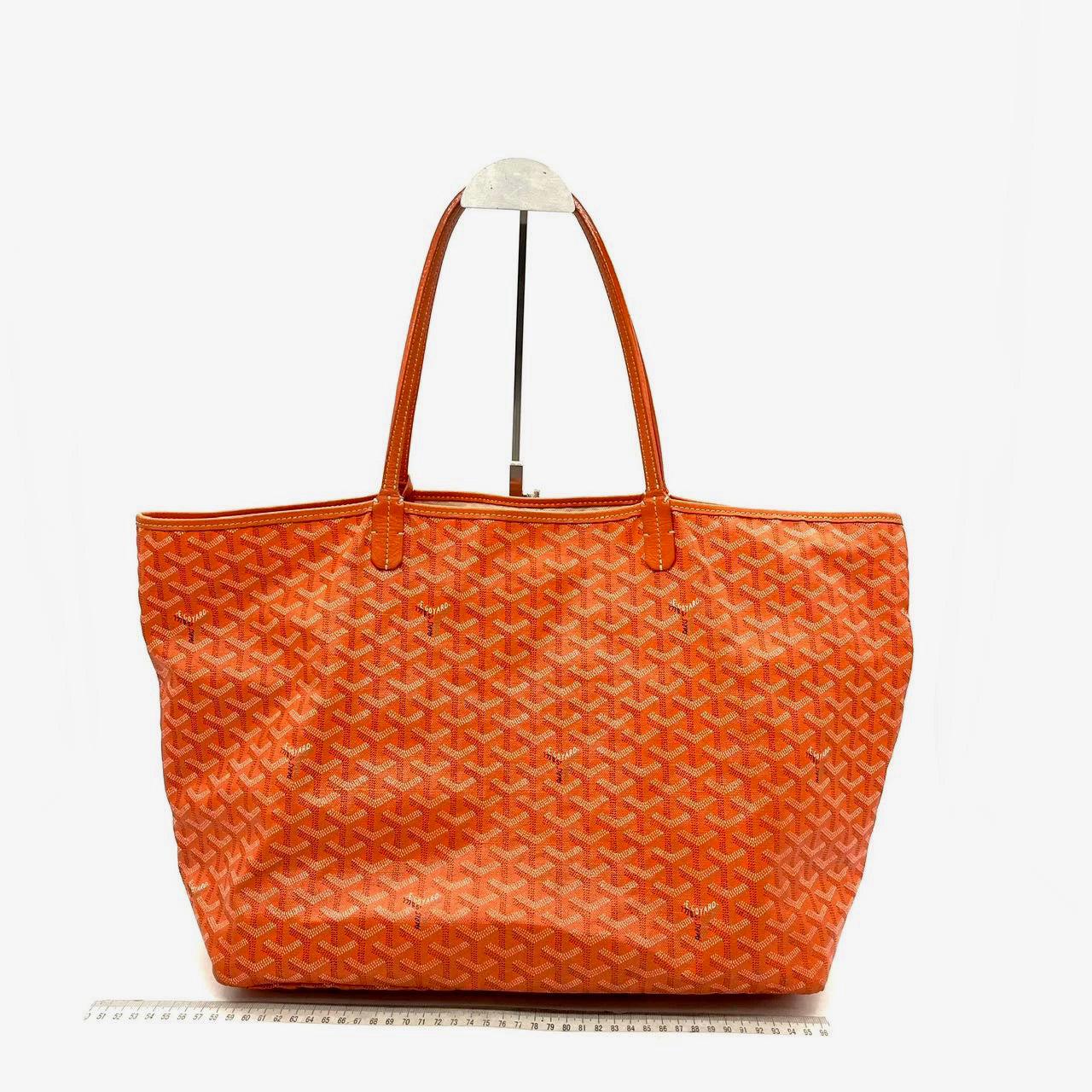 Goyard Saint Louis GM Large Tote Orange These are professional photos of the actual bag offered by Luxbags. Condition: Good condition with the corners showing some signs of wear. Several pen marks inside. Brand: Goyard Model: Saint Louis Tote Origin