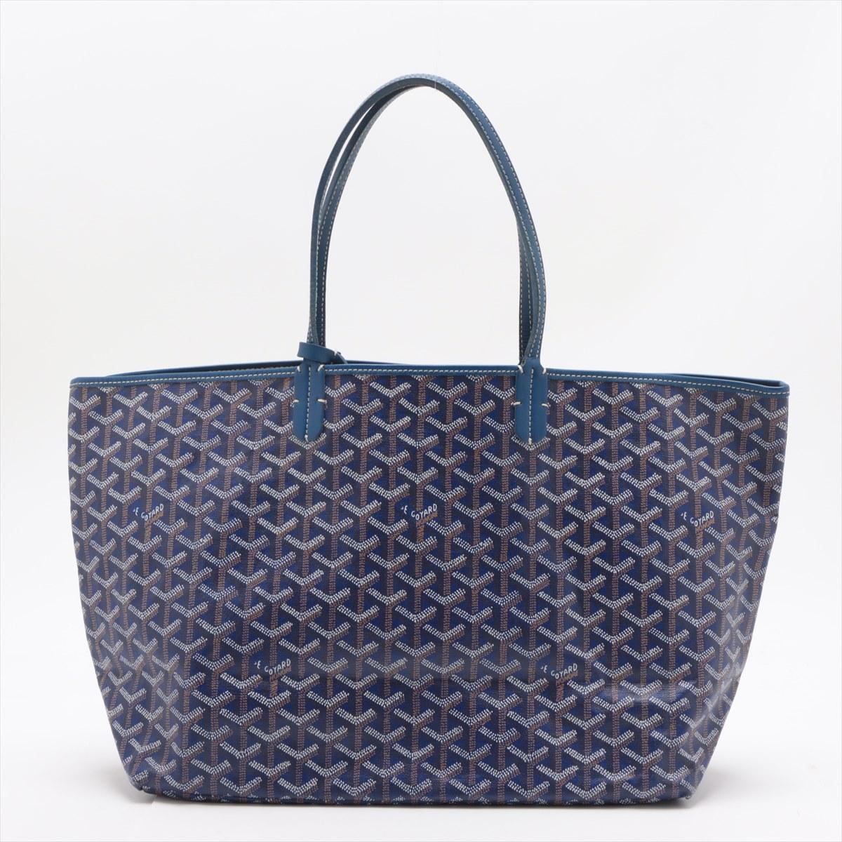 The Goyard Saint Louis PM Leather Tote Bag in Navy Blue is a luxurious and versatile accessory, blending timeless elegance with practicality. Crafted from Goyardine canvas and featuring a signature chevron pattern, the bag is lightweight yet