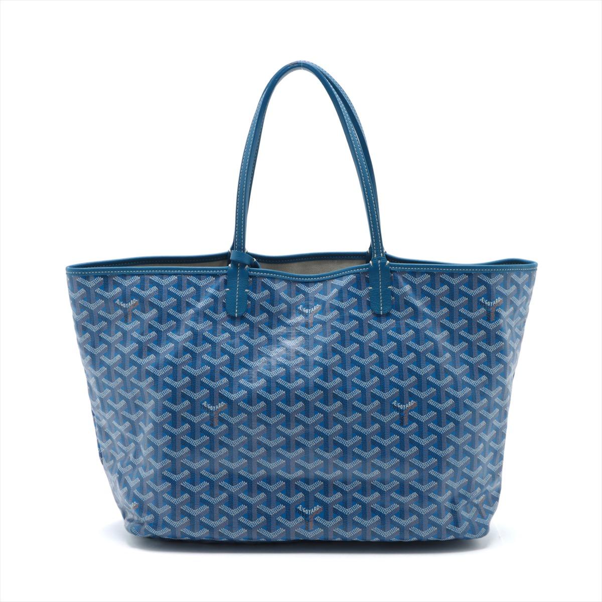 The Goyard Saint Louis PM Tote Bag in Blue epitomizes timeless elegance and practical luxury. Meticulously crafted by the prestigious French maison, Goyard, the iconic tote features brand's signature Chevron print on durable and water-resistant