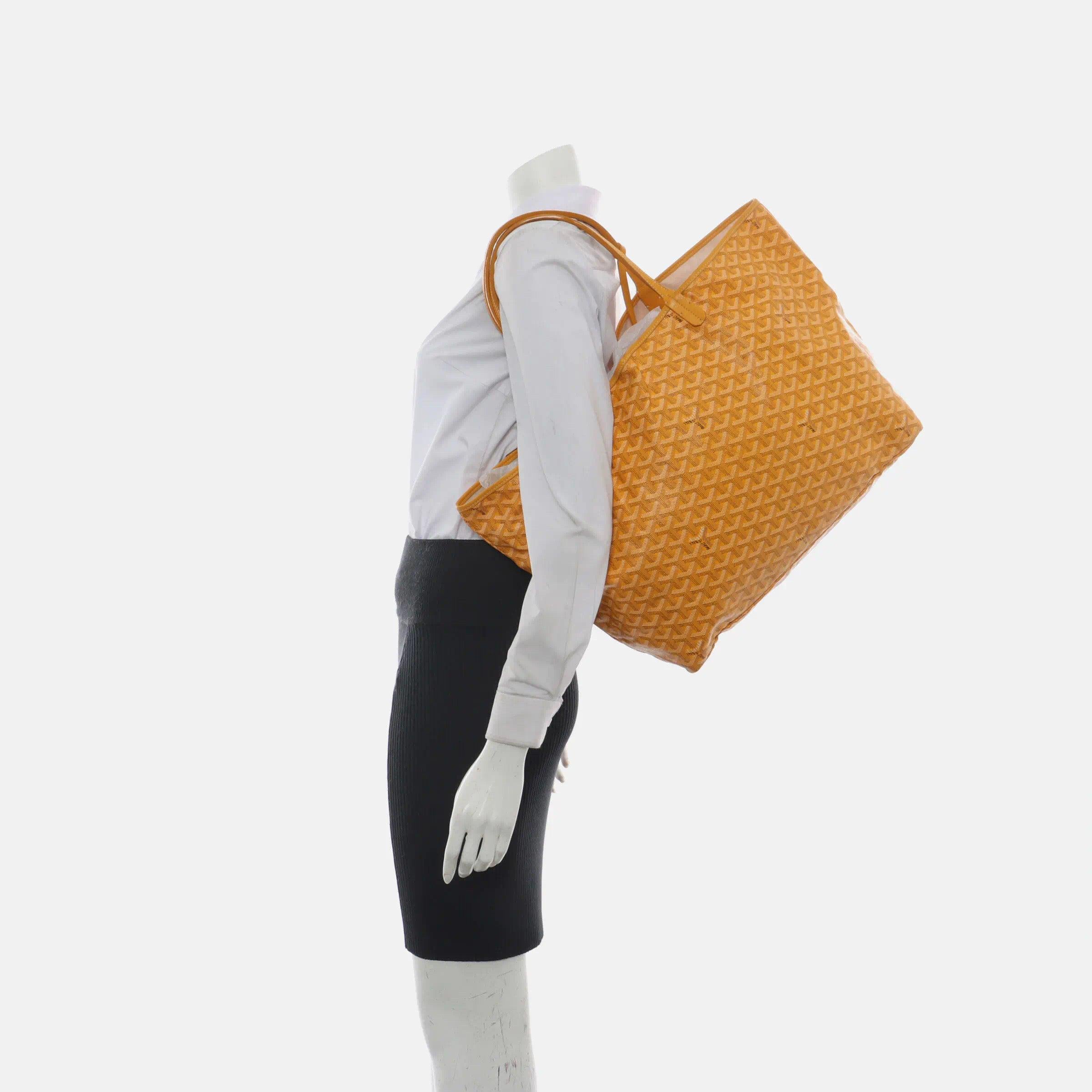 Goyard Saint Louis Tote 2014 GM Large Yellow These are professional photos of the actual bag offered by Luxbags. Condition: Very good condition. The outside is in excellent condition. Slight stains on the inside. Minor cracking on the bottom of the