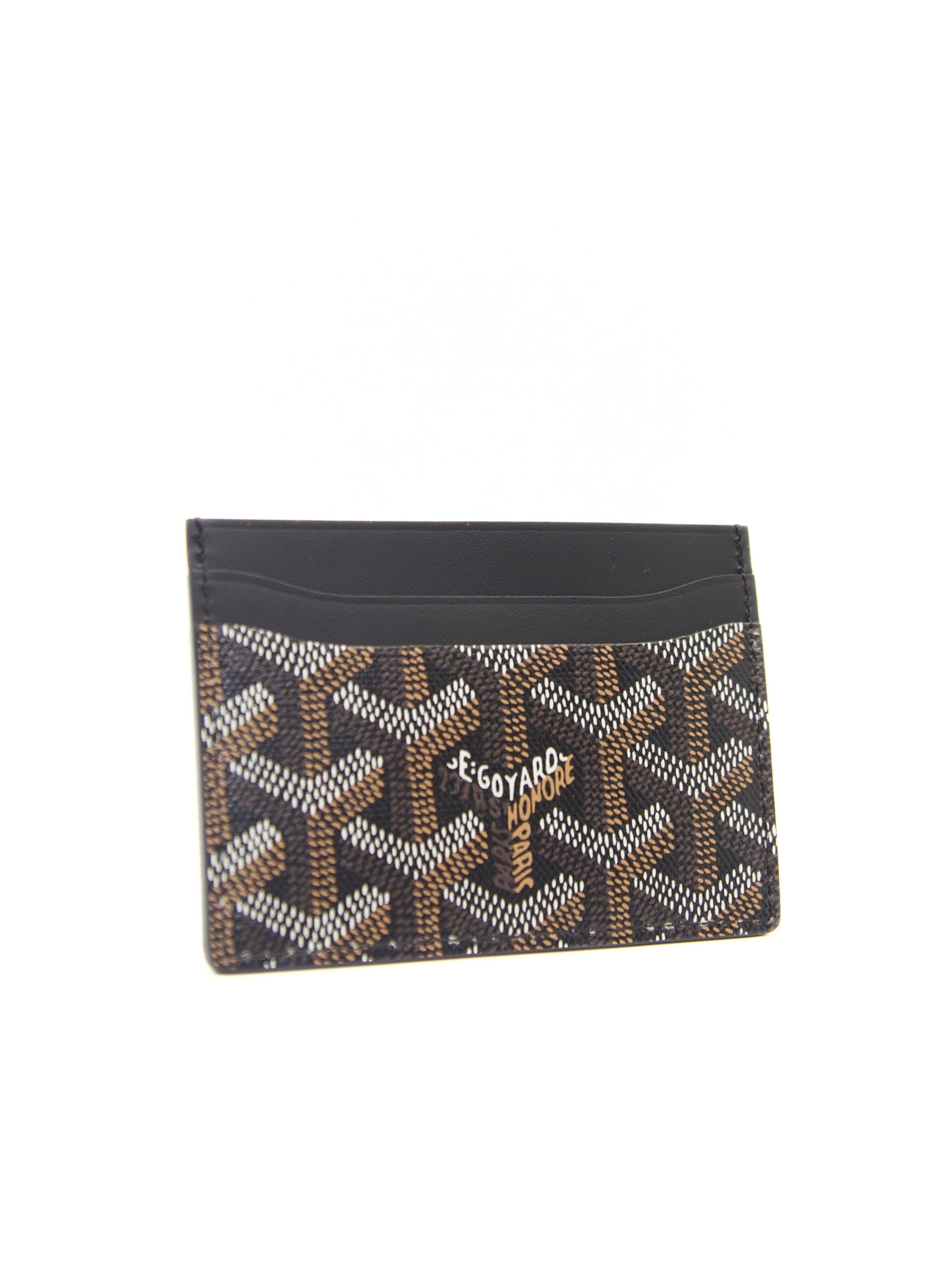 Goyard Saint-Sulpice Card Wallet in Black

Goyardine Canvas & Vauzelles Calfskin 

Accompanied by: Dustbag

Dimensions: 7 x 0.2 x 10.5cm