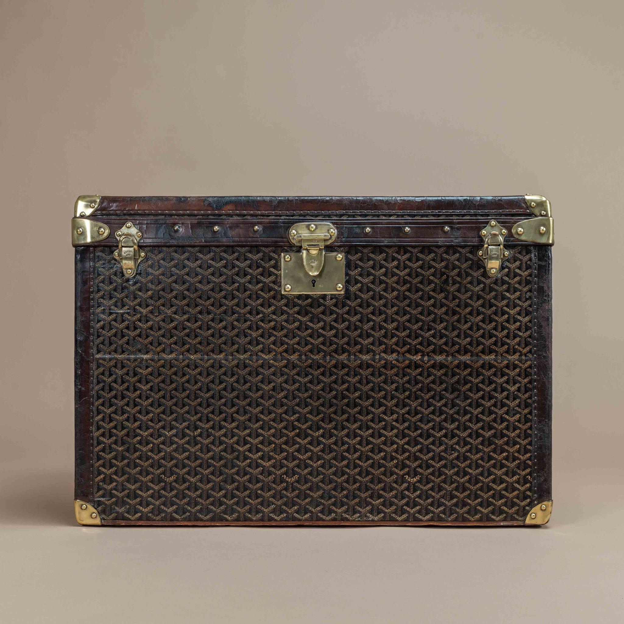 A splendid shoe trunk by Goyard with chevron pattern canvas covering, leather handles & trim, and polished brass fittings; circa 1900. The interior has the original lining and all the felt lined trays.

Dimensions: 65.5 cm/25¾ inches (width) x