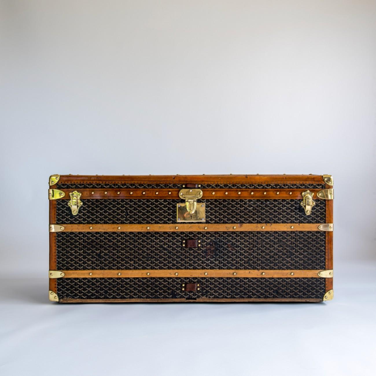 A splendid steamer trunk by Goyard with chevron pattern canvas (Goyardene) covering and polished brass lock, catches & handles; circa 1915.

In 1853 François Goyard took over from Moral - a trunk maker who was trunk maker to the heir to the French