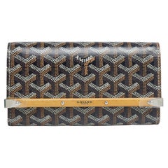 Goyard - Pochette Monte Carlo en toile et cuir enduite de goyardine brun clair