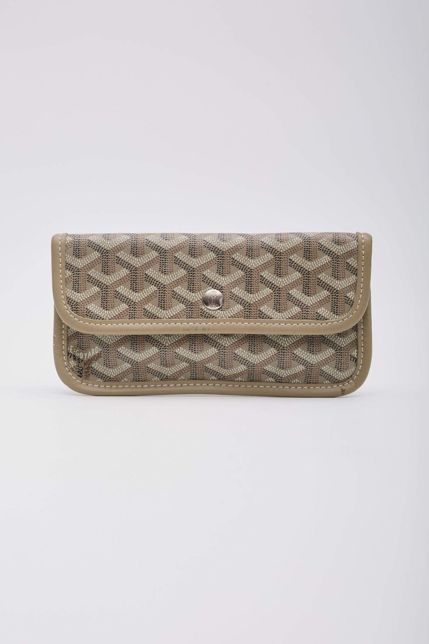 Color: taupe
Material: Coated canvas with leather
Condition: Very good.
Made in France

Measurements~
Height 4.25”
Width 7.5”