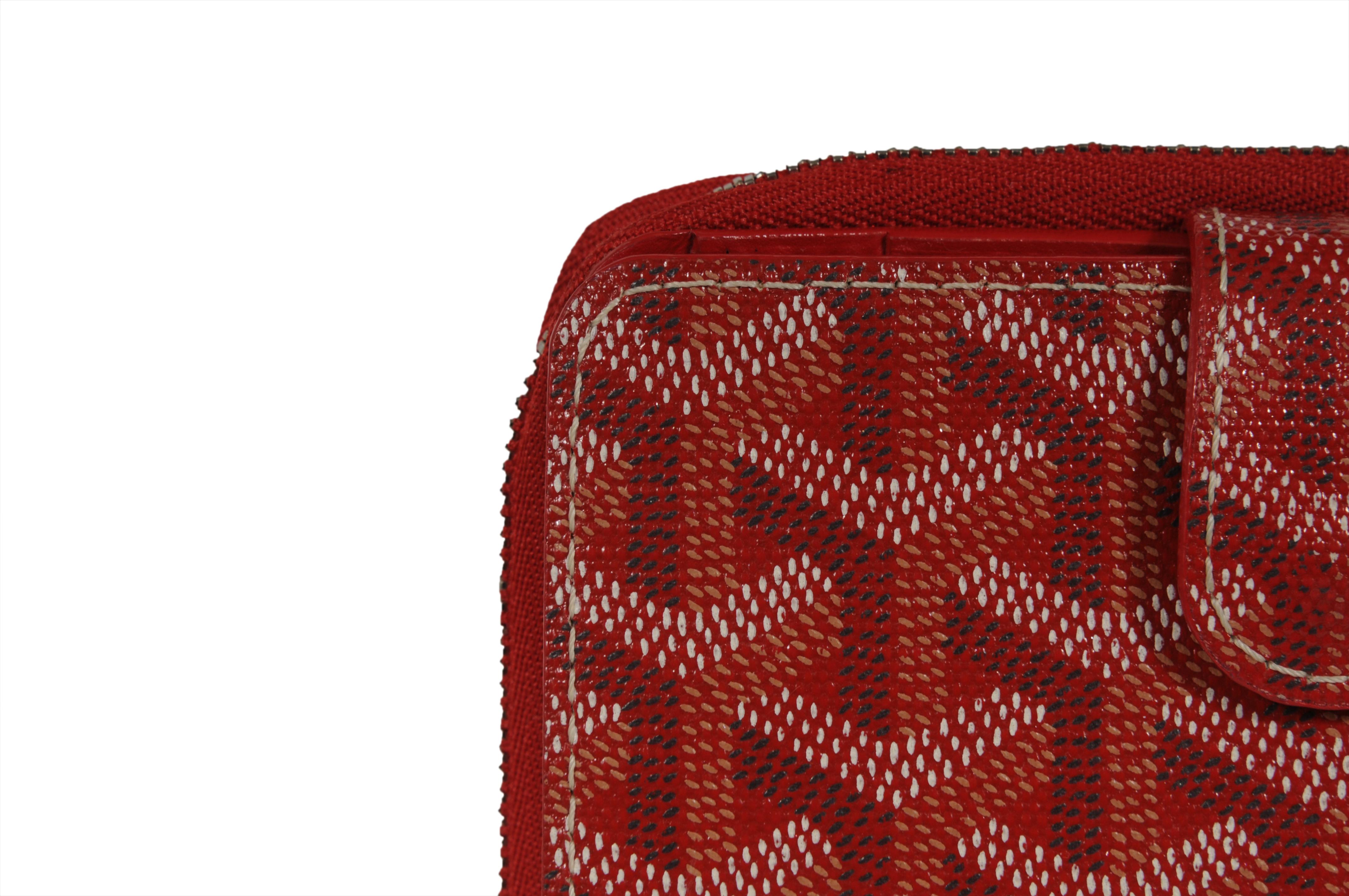 - Red Goyardine exterior

- Four Slit compartments

- Single interior bill compartment

- Six card slots

- Exterior zip compartment



Condition: 

The wallet is new. This is a discontinued item from goyard and the exterior has SLIGHT patina. No