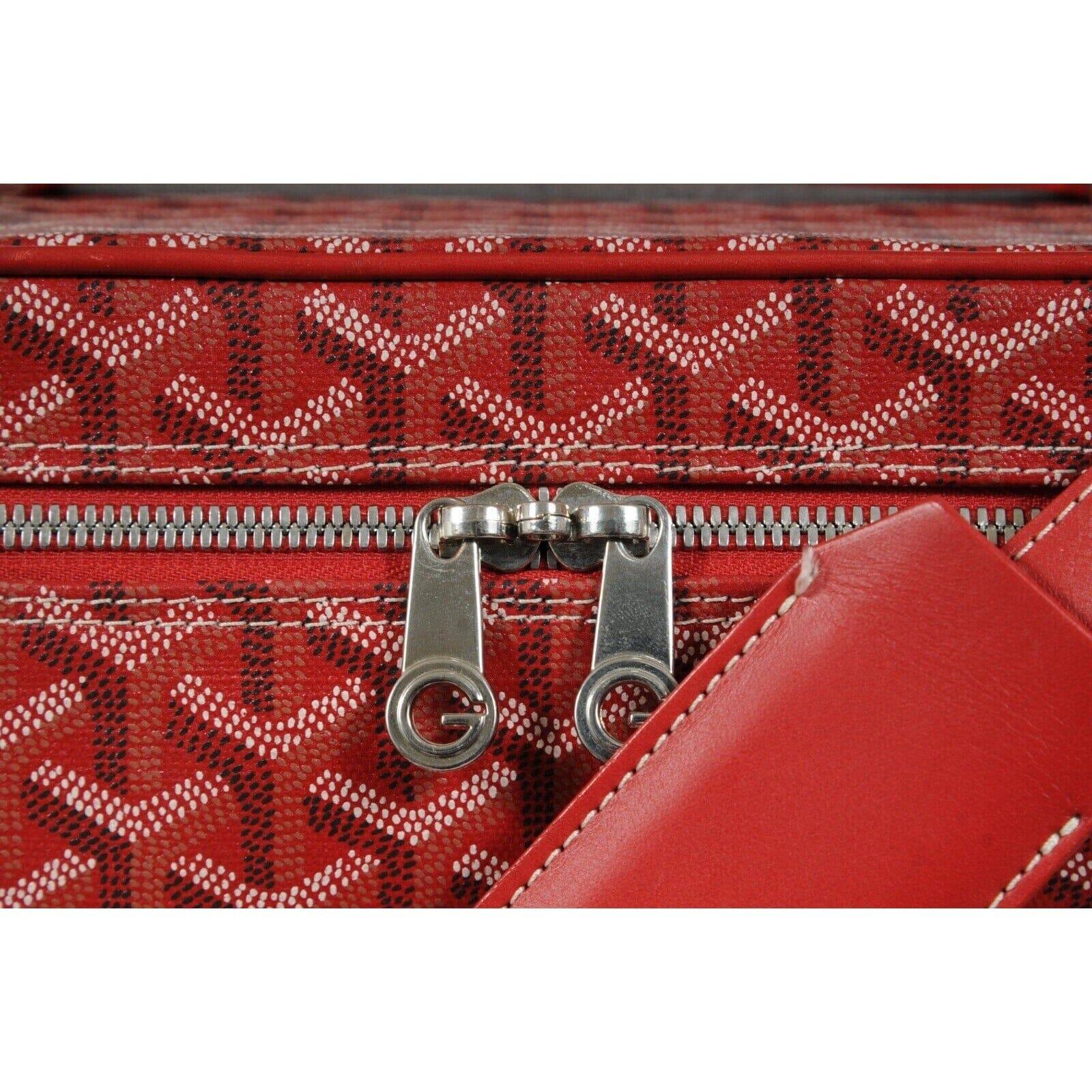 - This is the discontinued LARGER vanity that has been out of production for quite sometime. 

- BIGGER BAGS ARE IN, MICRO AND SMALL BAGS ARE OUT !!!!

- Red goyardine exterior

- Two interior pockets

-  Perfect for travel




Condition: 

The bag