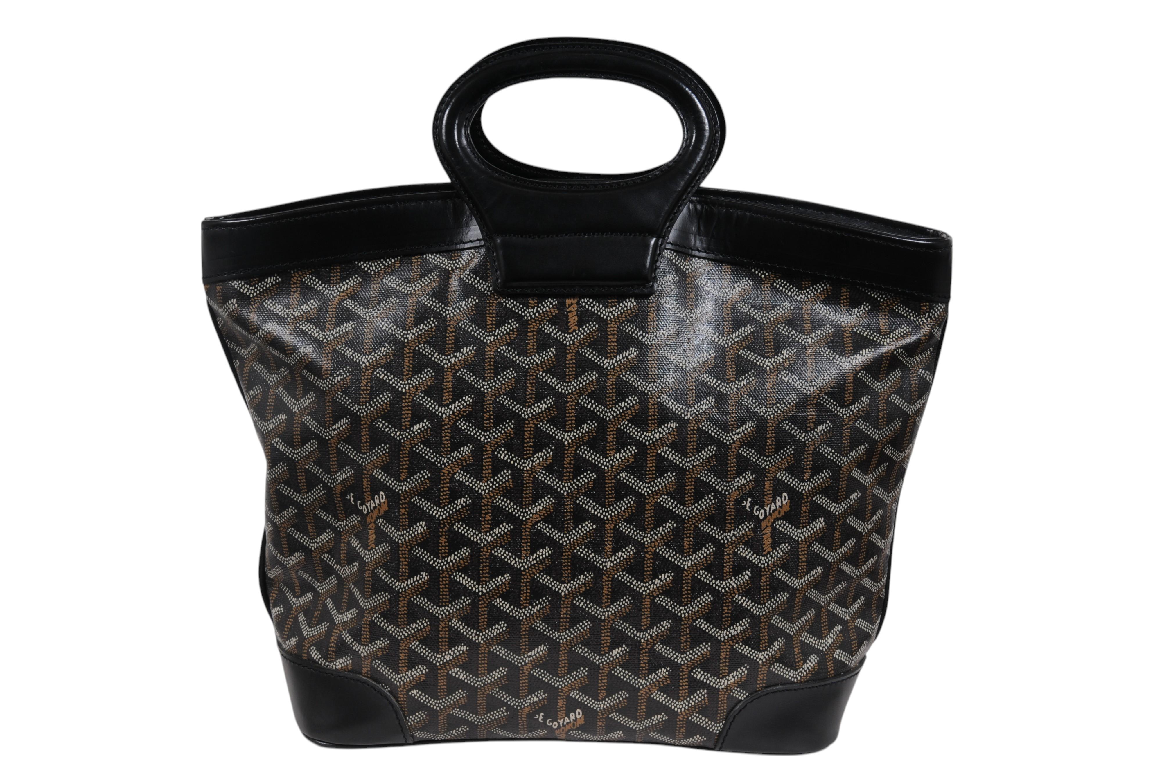 - Black exterior

- Zip closure

- Made in France



Condition: 

The bag is in overall decent condition with no major imperfections, the corners are clean, the exterior is free of harsh stains and the bag still holds shape when
