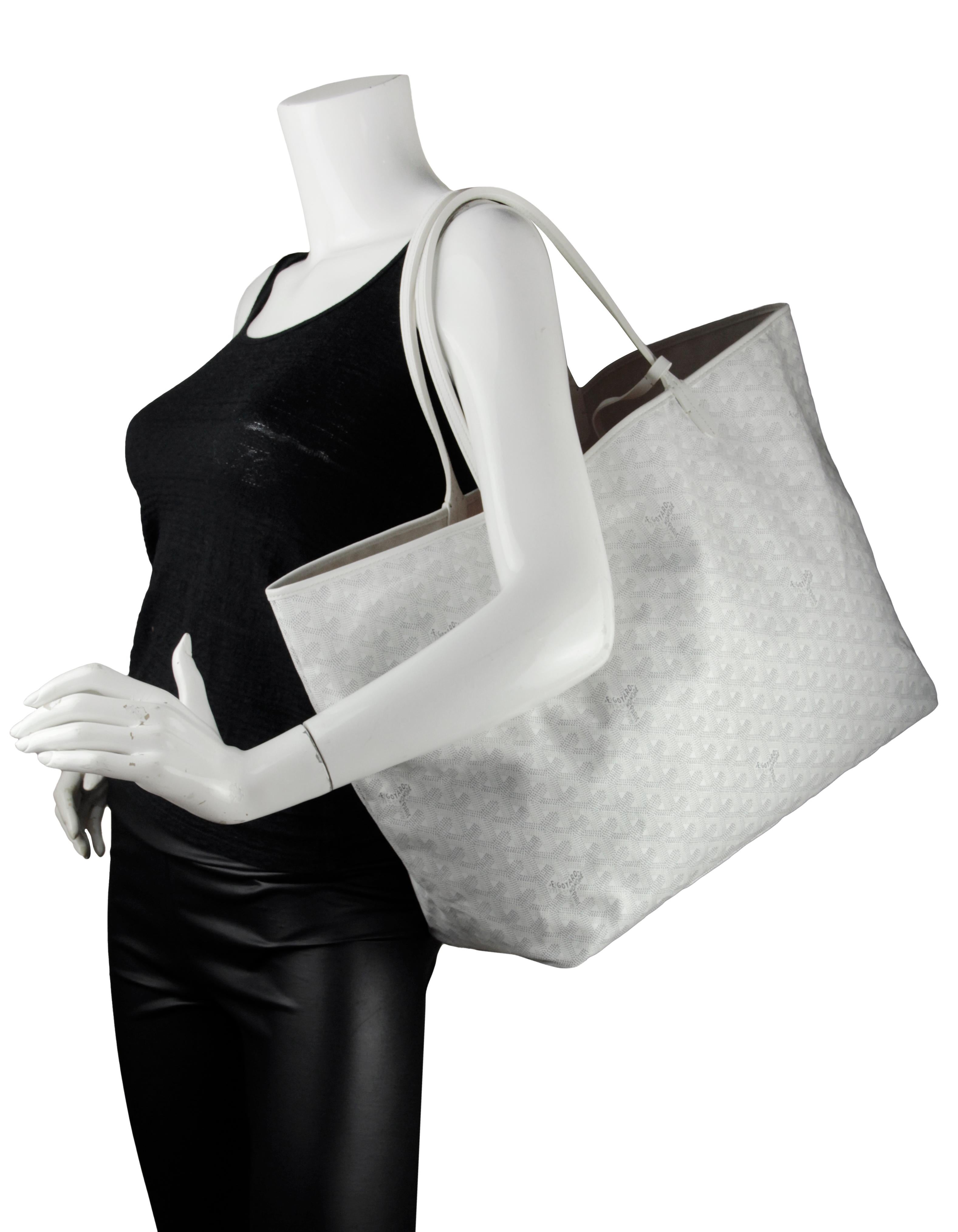 Goyard White Canvas Goyardine Saint Louis GM Tote Bag w/ Insert

Made In: France
Color: White
Hardware: Silvertone
Materials: Canvas
Lining: Canvas
Closure/Opening: Open top
Exterior Pockets: None
Interior Pockets: Insert with snap closure
Exterior