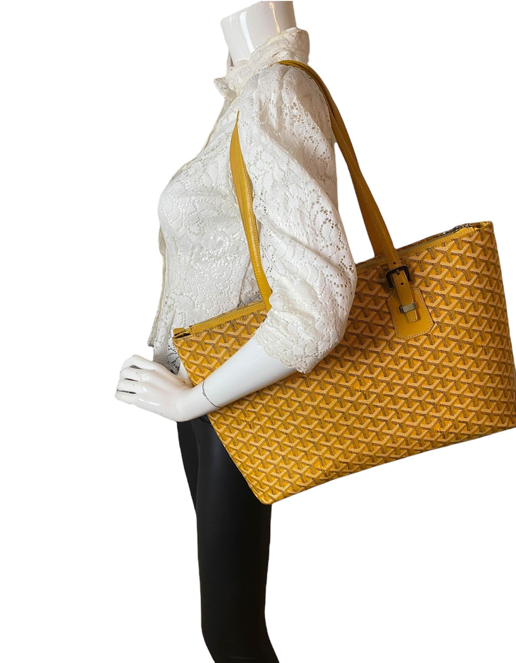 Goyard Yellow Goyardine Okinawa GM Tote Bag

Made In: Italy
Color: Yellow
Hardware: Silver
Materials: Coated canvas and leather
Lining: Fine textile
Closure/Opening: Zip top
Exterior Pockets: None
Interior Pockets: One zip, one slit
Exterior
