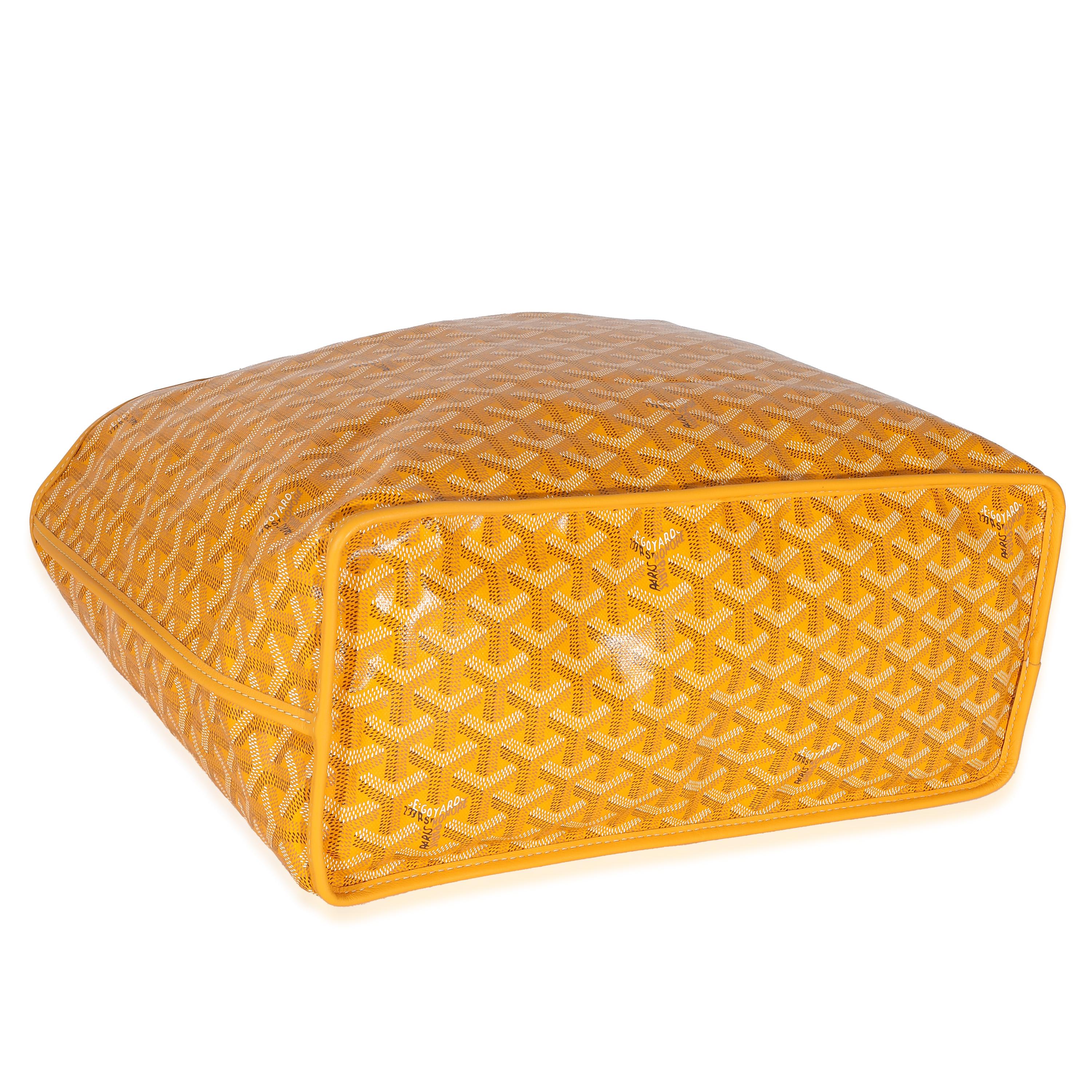 Listing Title: Goyard Yellow Goyardine Canvas Reversible Anjou PM
SKU: 137737
MSRP: 2960.00 USD
Condition: Pre-owned 
Condition Description: Goyard’s signature Goyardine pattern has quietly taken over the luxury fashion scene. A heritage brand that