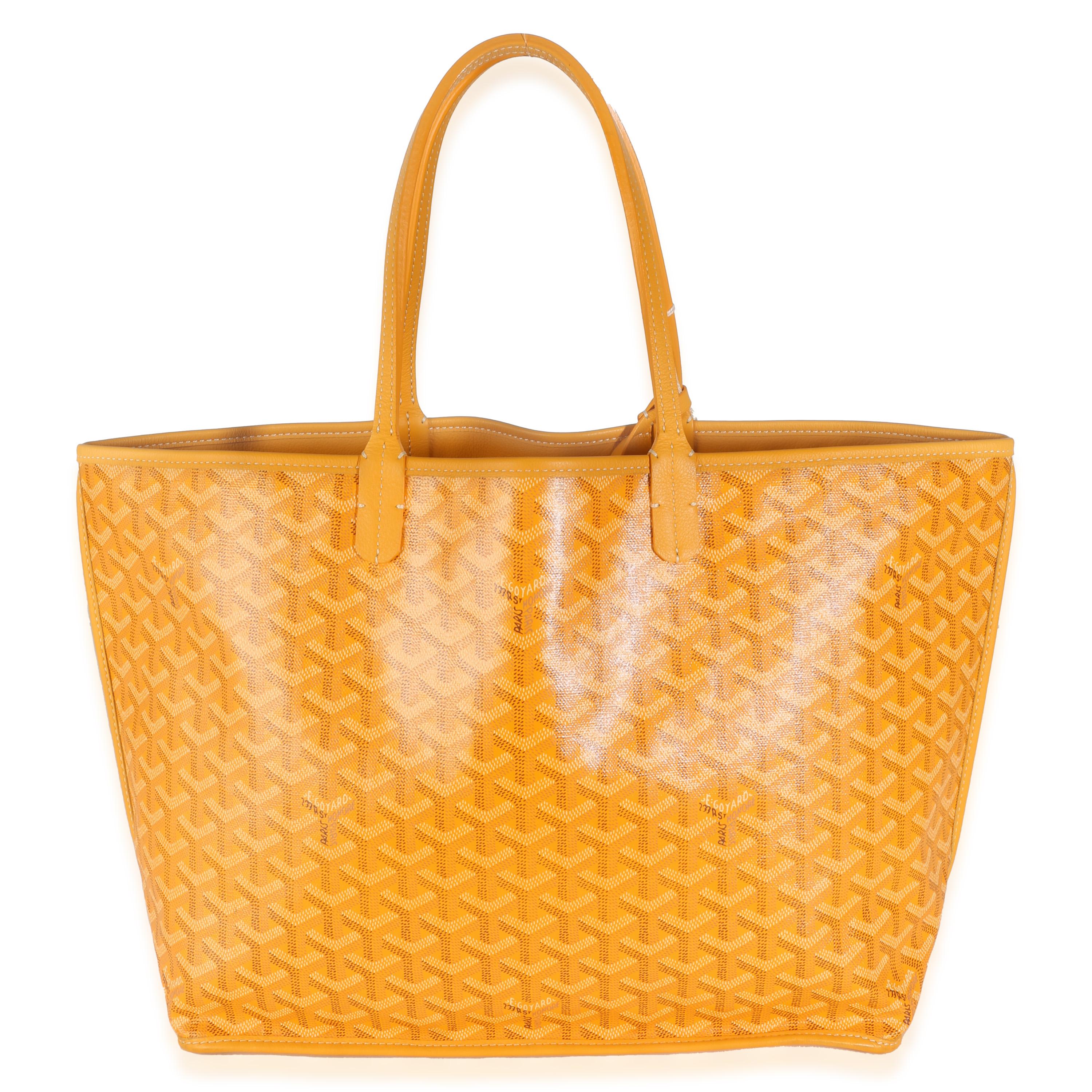 Listing Title: Goyard Yellow Goyardine Canvas Reversible Anjou PM
SKU: 142450
Condition: Pre-owned 
Condition Description: Goyard’s signature Goyardine pattern has quietly taken over the luxury fashion scene. A heritage brand that has been around