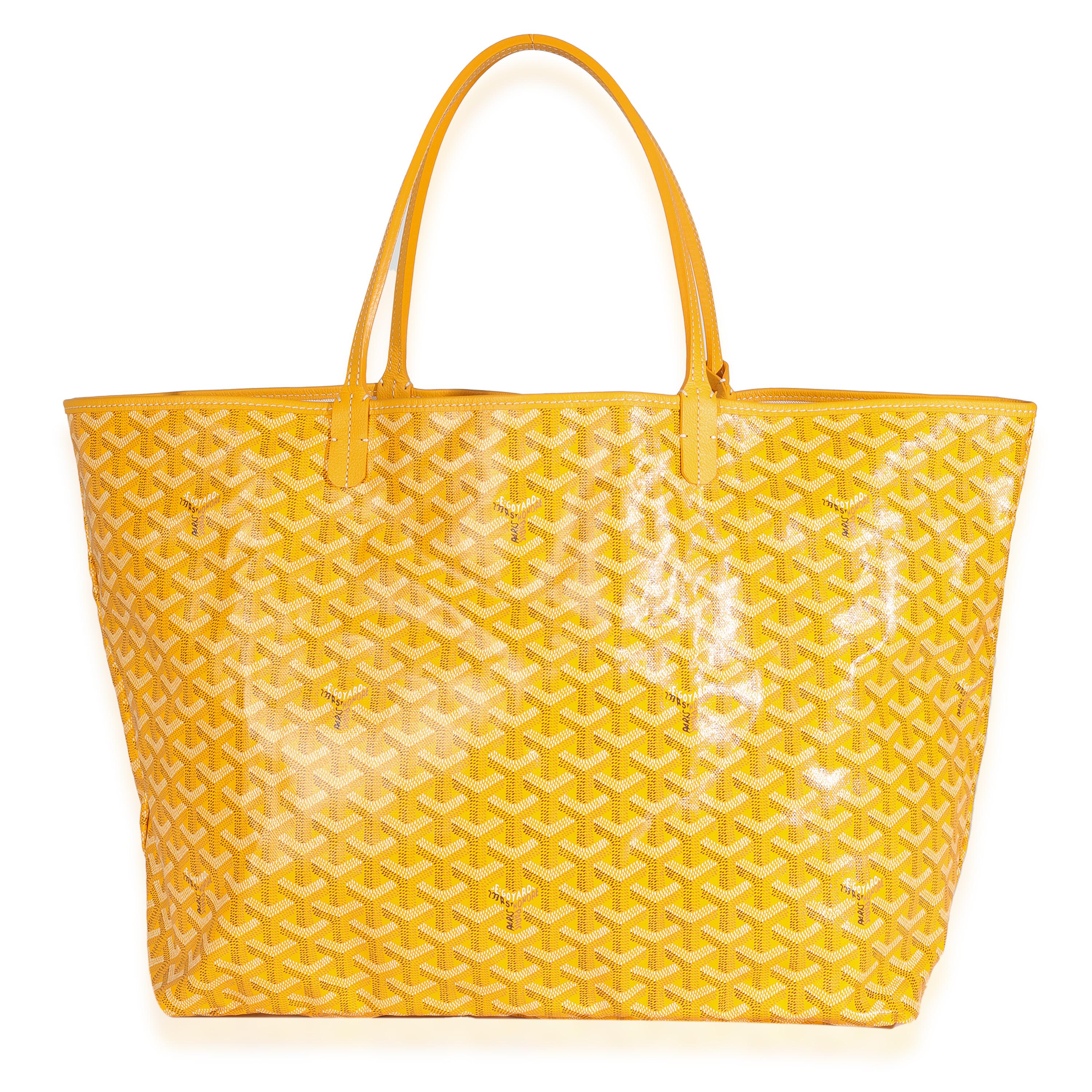 Listing Title : Goyard Jaune Goyardine Toile Saint Louis GM
SKU : 147219
Condit : Usagé 
Condit : Le motif Goyardine, signature de Goyard, s'est discrètement imposé sur la scène de la mode de luxe. Marque patrimoniale qui existe depuis 1853, Goyard