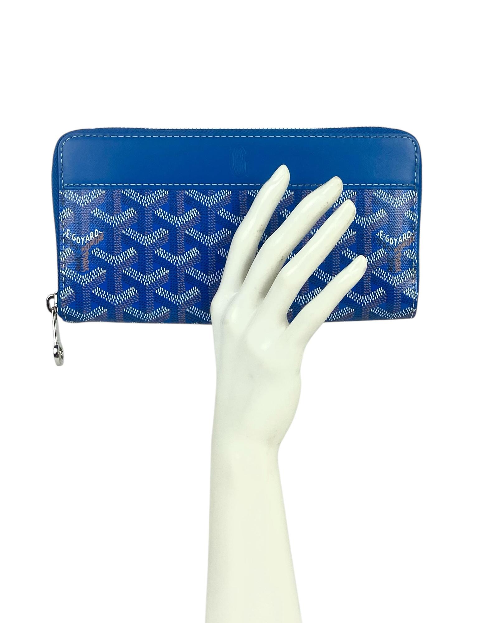 Goyardine Blue Goyardine Matignon Zip Around GM Wallet

Color: Blue
Materials: Goyardine canvas & vauzelles calfskin
Interior: Blue Nièvre Goatskin Lining 
Compartments:12 card slots, 2 large flat pockets, compartments, secure change pocket
Overall
