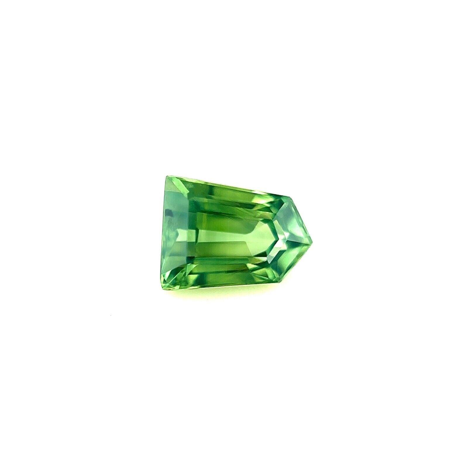 GRA Certified 1.00Ct Fancy Cut Yellow Green Sapphire Untreated Gem VVS

Unique Natural GRA Certified Untreated Yellow Green Sapphire Gemstone.
1.00 Carat sapphire with a beautiful vivid yellow green colour and an excellent fancy cut and ideal polish