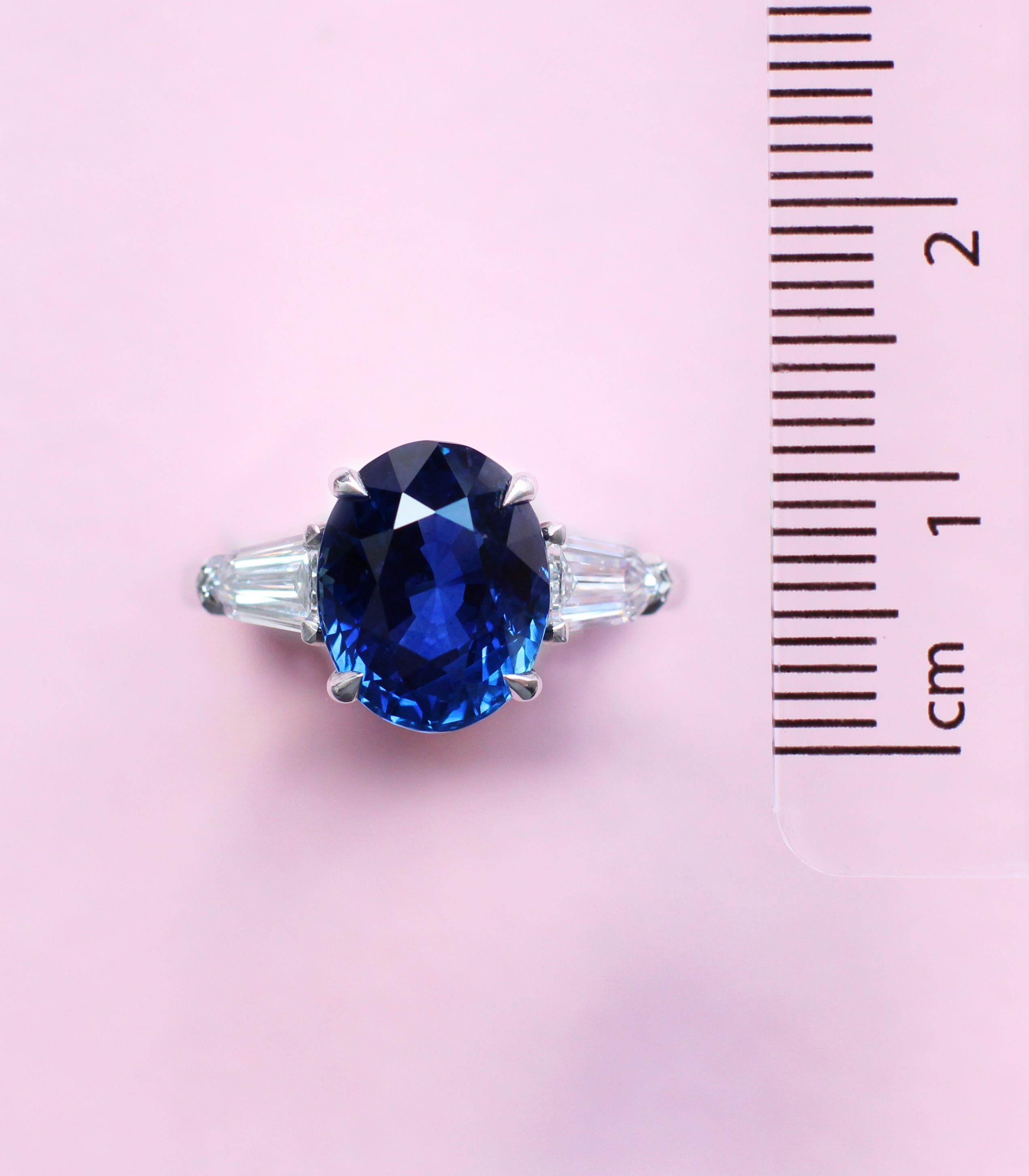 Oval Cut GRS Certified 5.29 Carats Royal Blue Sapphire Three Stone Ring in Platinum For Sale