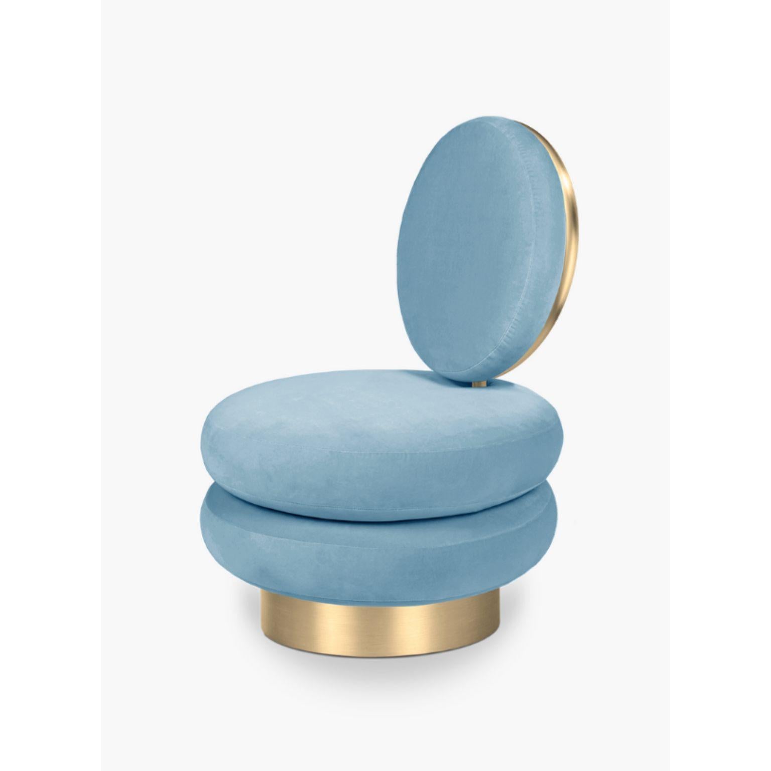 Grace armchair by Royal Stranger
Dimensions: W 70 x D 70 x H 96 cm 
Materials: Bouclé effect, polished brass
Color: Light blue. 
A round and soft shaped sofa with an elegant touch of goldish glamour and elegance. 

Royal Stranger is an