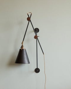 Modern Iron and Black Leather Grace Articulating Wall Sconce - Plug In
