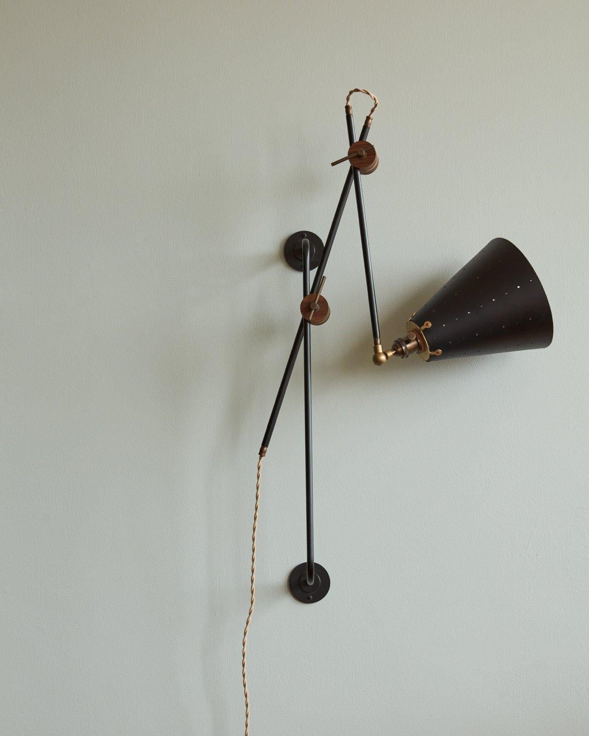 black articulating wall sconce