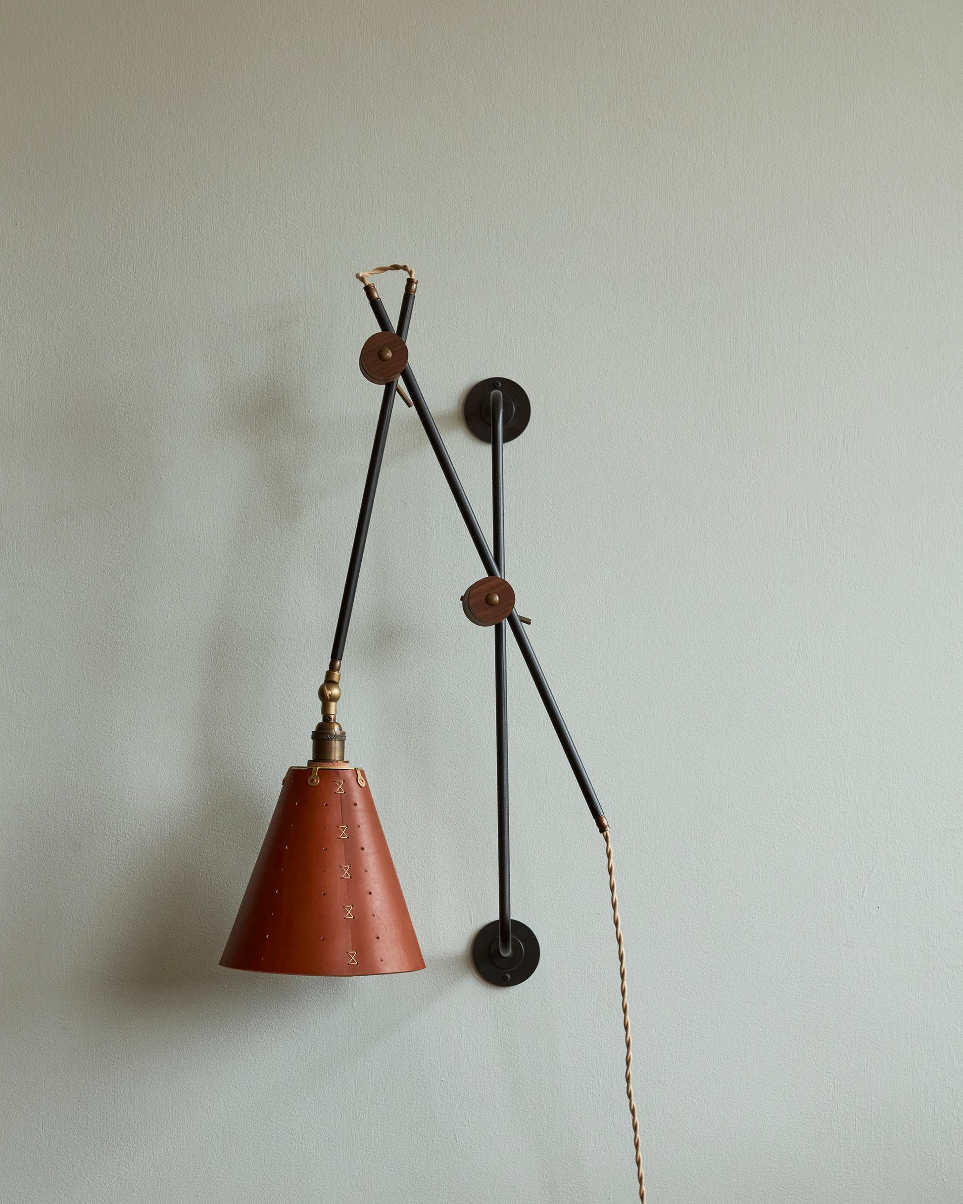 Modern Iron and Tan Leather Grace Articulating Wall Sconce - Plug In In New Condition For Sale In Philadelphia, PA