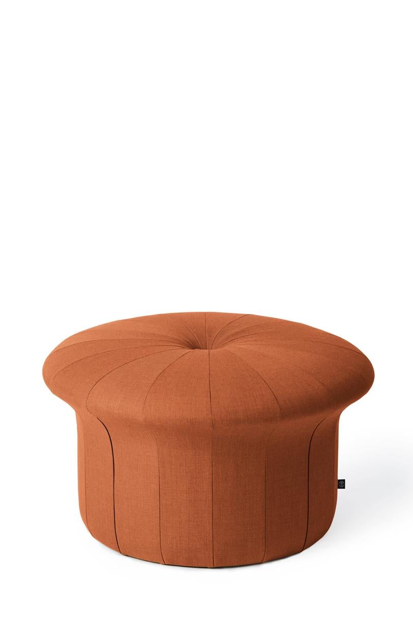 Grace burnt orange pouf by Warm Nordic
Dimensions: D 77 x H 45 cm
Material: Textile upholstery, Foam, Wood.
Weight: 15.5 kg
Also available in different colours and finishes.

A luxurious pouffe in a sophisticated, inviting idiom, created by