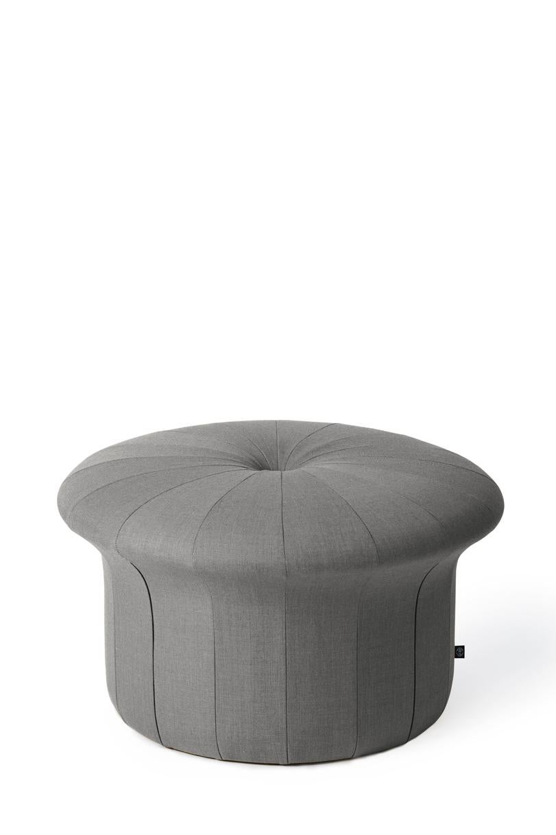 Grace grey Melange pouf by Warm Nordic
Dimensions: D77 x H 45 cm
Material: Textile upholstery, Foam, Wood.
Weight: 15.5 kg
Also available in different colours and finishes. 

A luxurious pouffe in a sophisticated, inviting idiom, created by