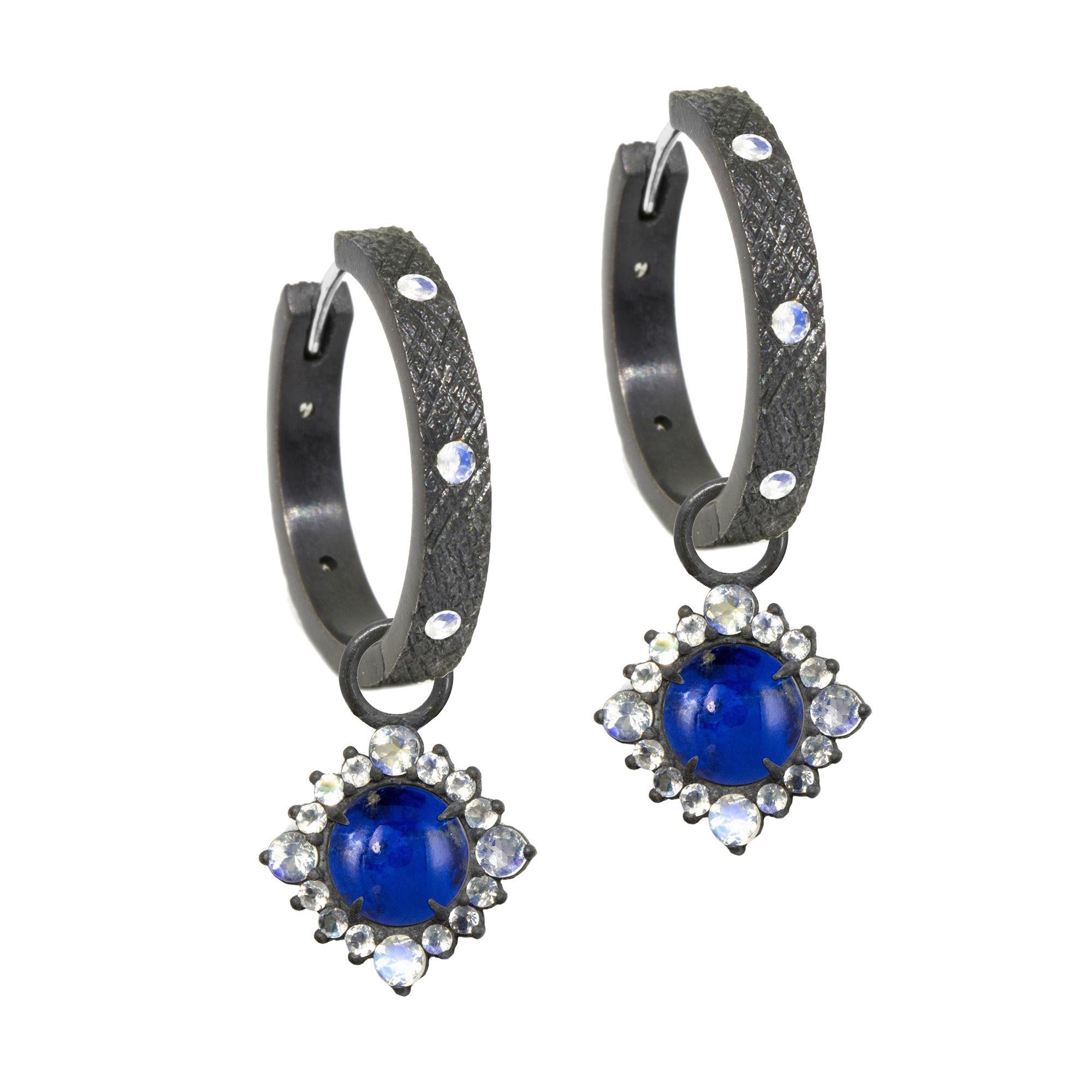  Our moonstone-accented Grace Silver Earring Charms are rimmed in black oxidized silver, with a vivid lapis gemstone at the center. Pair them with an hoop, mix them with any style, the Grace Silver Earring Charms made a great addition. 

Nina Nguyen