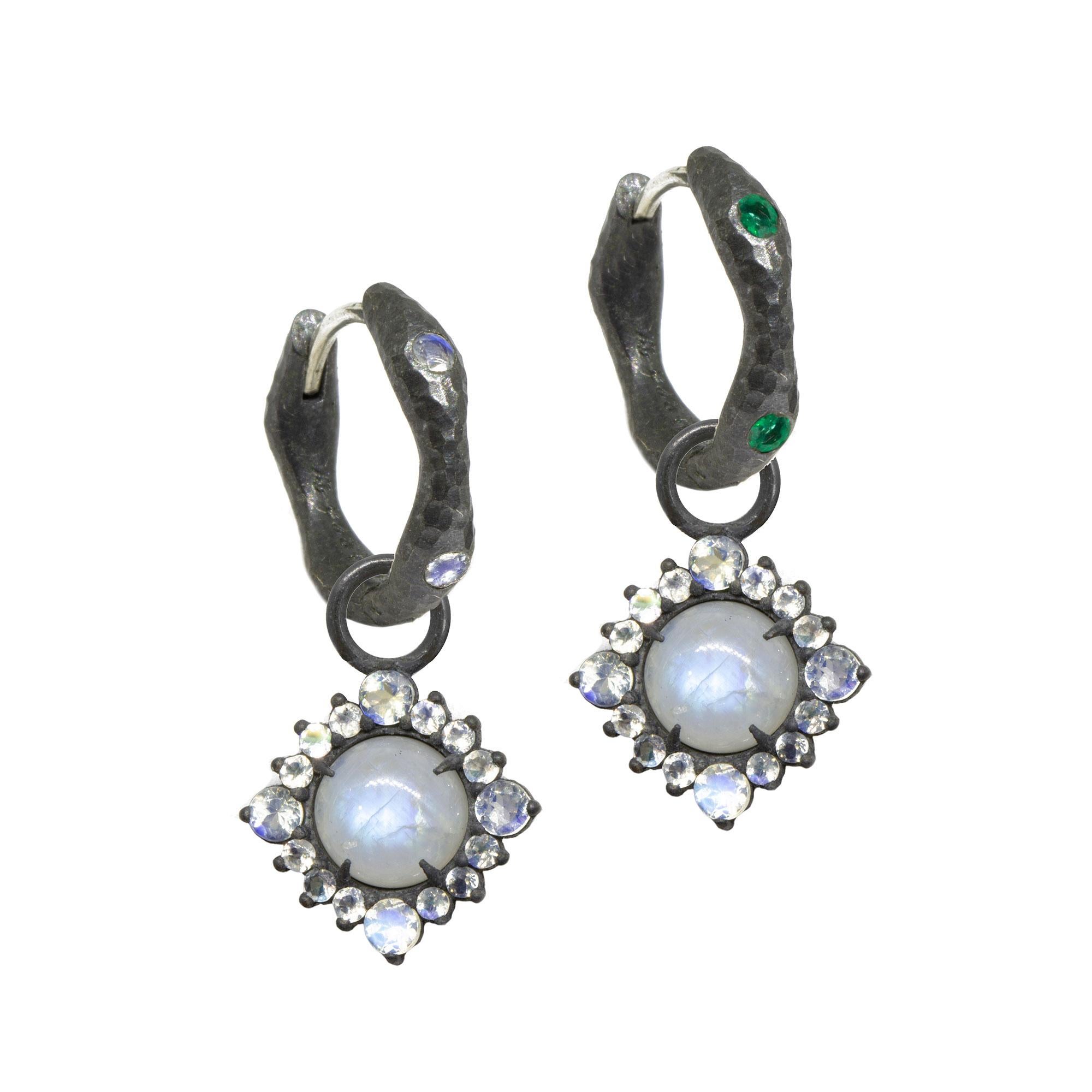  Our moonstone-accented Grace Silver Earring Charms are rimmed in black oxidized silver, with a vivid moonstone gemstone at the center. Pair them with an hoop, mix them with any style, the Grace Silver Earring Charms made a great addition. 

Nina