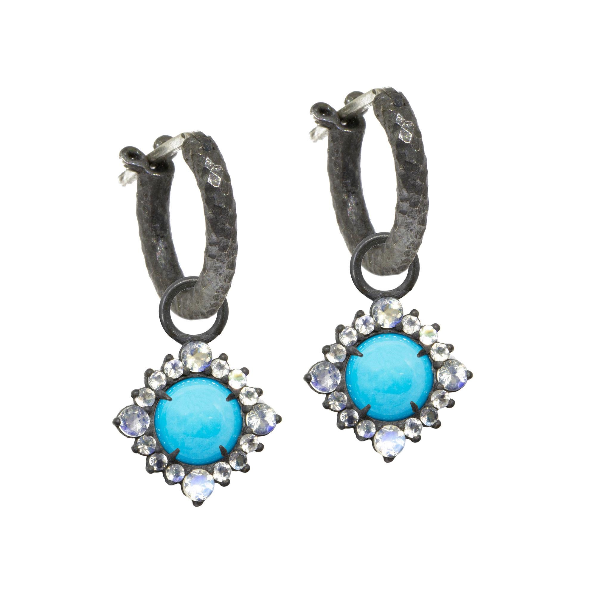  Our moonstone-accented Grace Silver Earring Charms are rimmed in black oxidized silver, with a vivid turquoise gemstone at the center. Pair them with an hoop, mix them with any style, the Grace Silver Earring Charms made a great addition. 

Nina