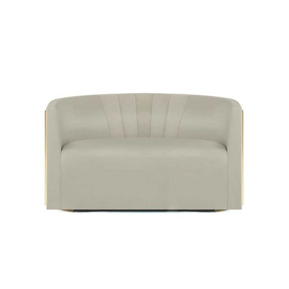 Mansfield is an accent sleek sofa with an undeniable modern elegance. Its rounded forms are a striking addition to any living room, along with the velvet upholstery and the polished brass on the base.

Materials: polished brass and velvet