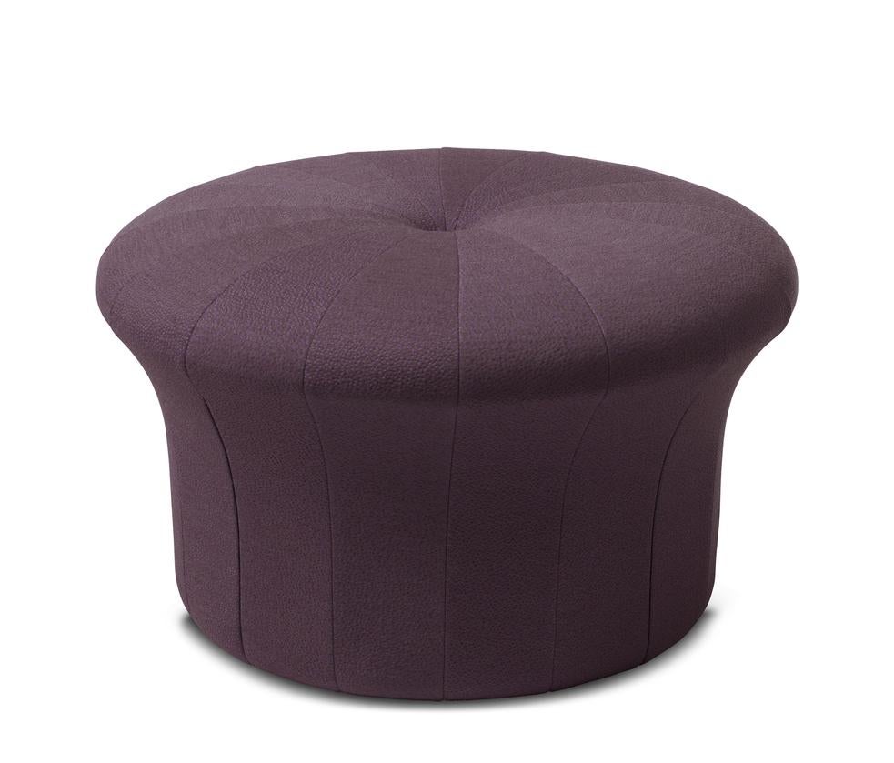 Grace sprinkles eggplant pouf by Warm Nordic
Dimensions: D77 x H 45 cm
Material: Textile upholstery, Foam, Wood.
Weight: 15.5 kg
Also available in different colours and finishes. 

A luxurious pouffe in a sophisticated, inviting idiom, created