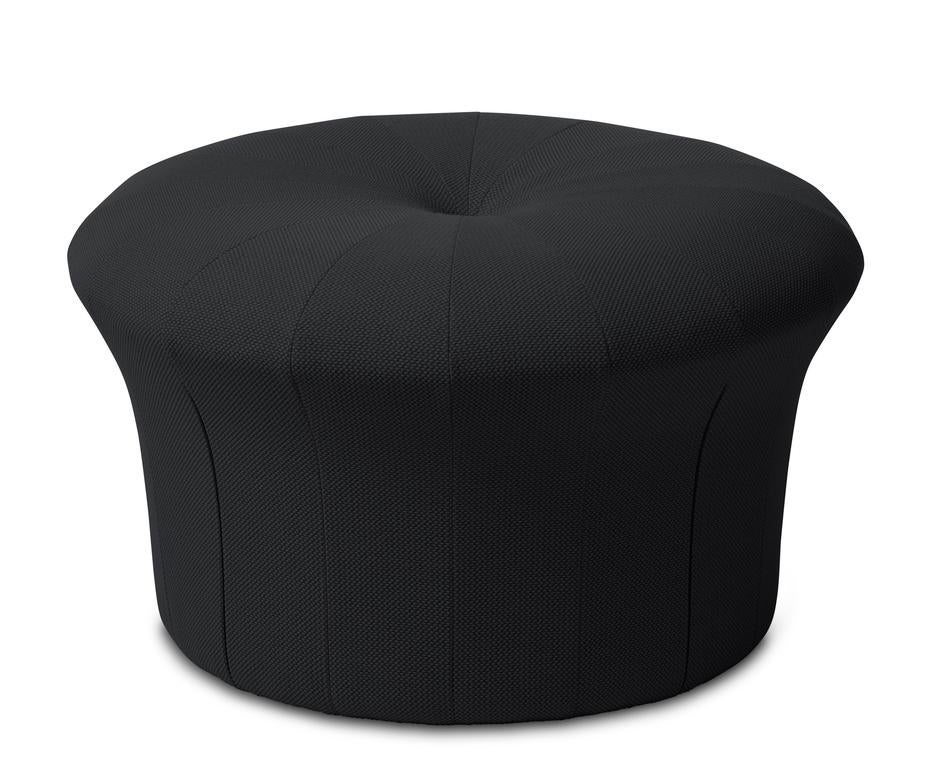 Grace Storm pouf by Warm Nordic
Dimensions: D77 x H 45 cm
Material: Textile upholstery, Foam, Wood.
Weight: 15.5 kg
Also available in different colors and finishes. 

A luxurious pouffe in a sophisticated, inviting idiom, created by the